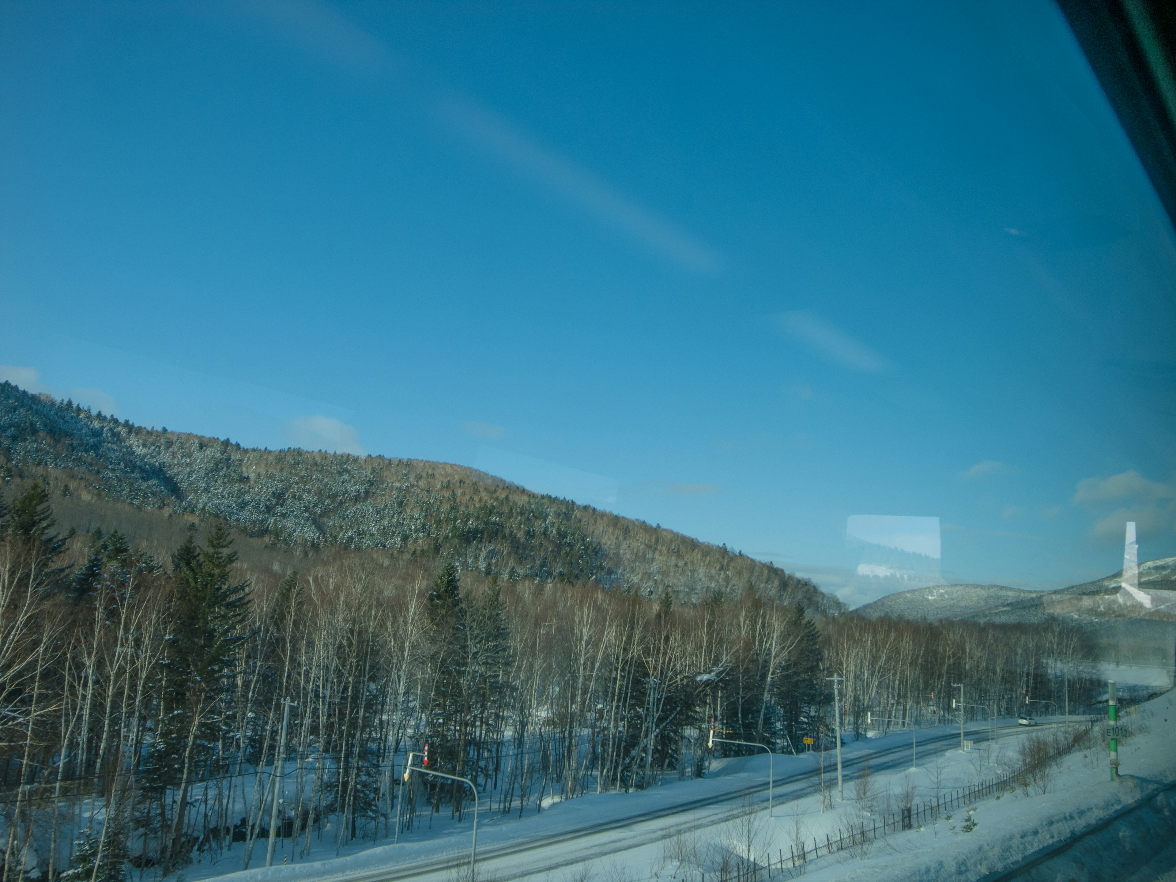 Snow-covered mountains and blue sky landscape