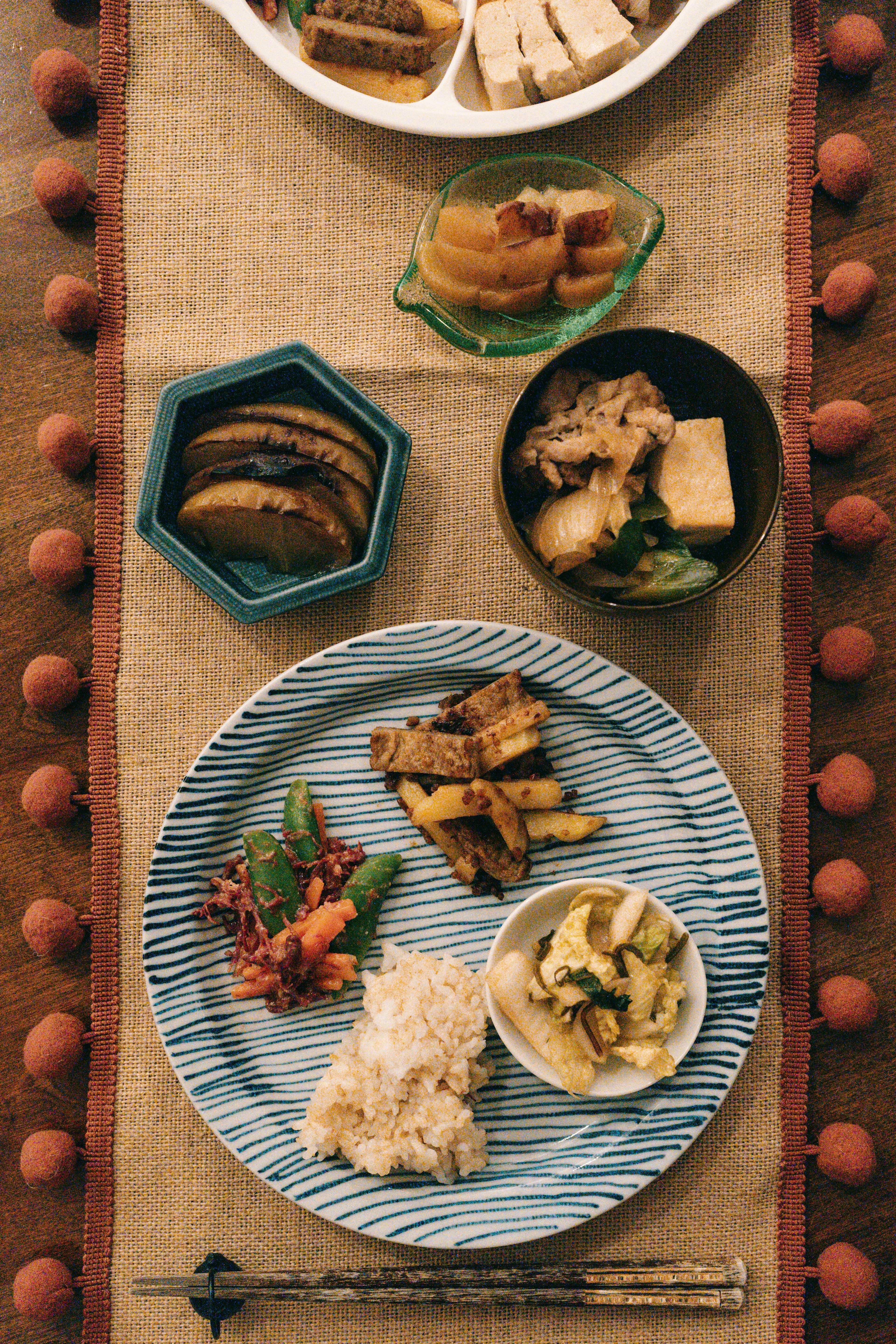 A beautifully arranged Japanese meal on a table