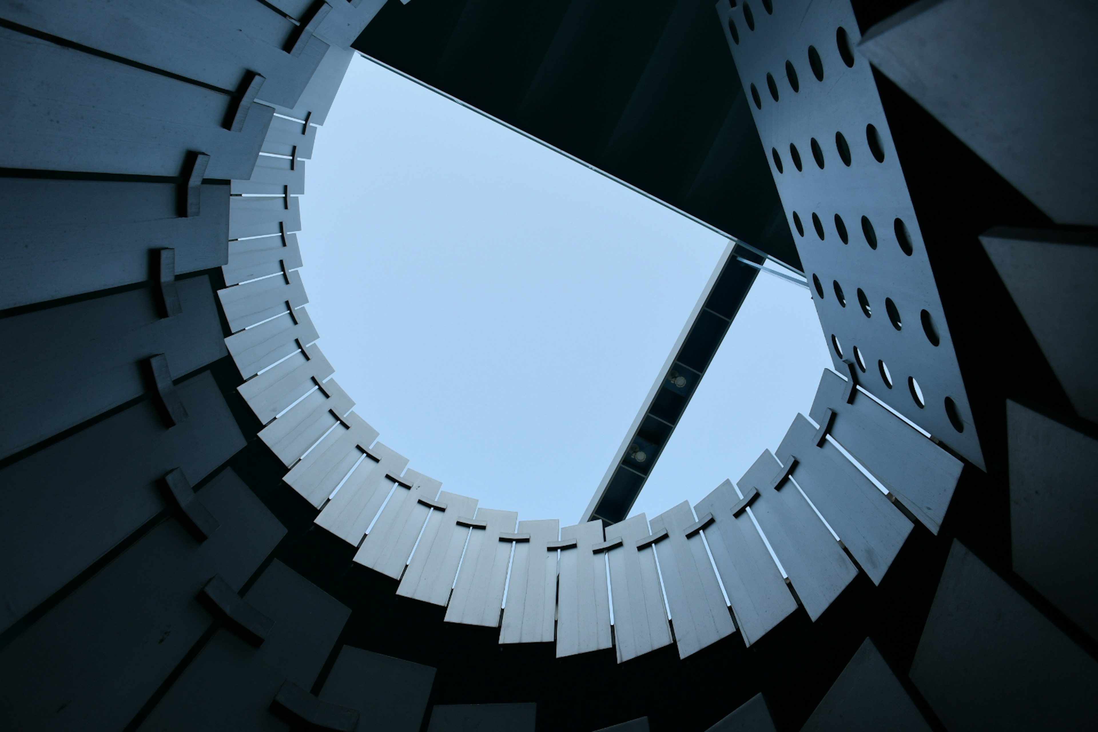 Impressive design of a spiral staircase viewed from below