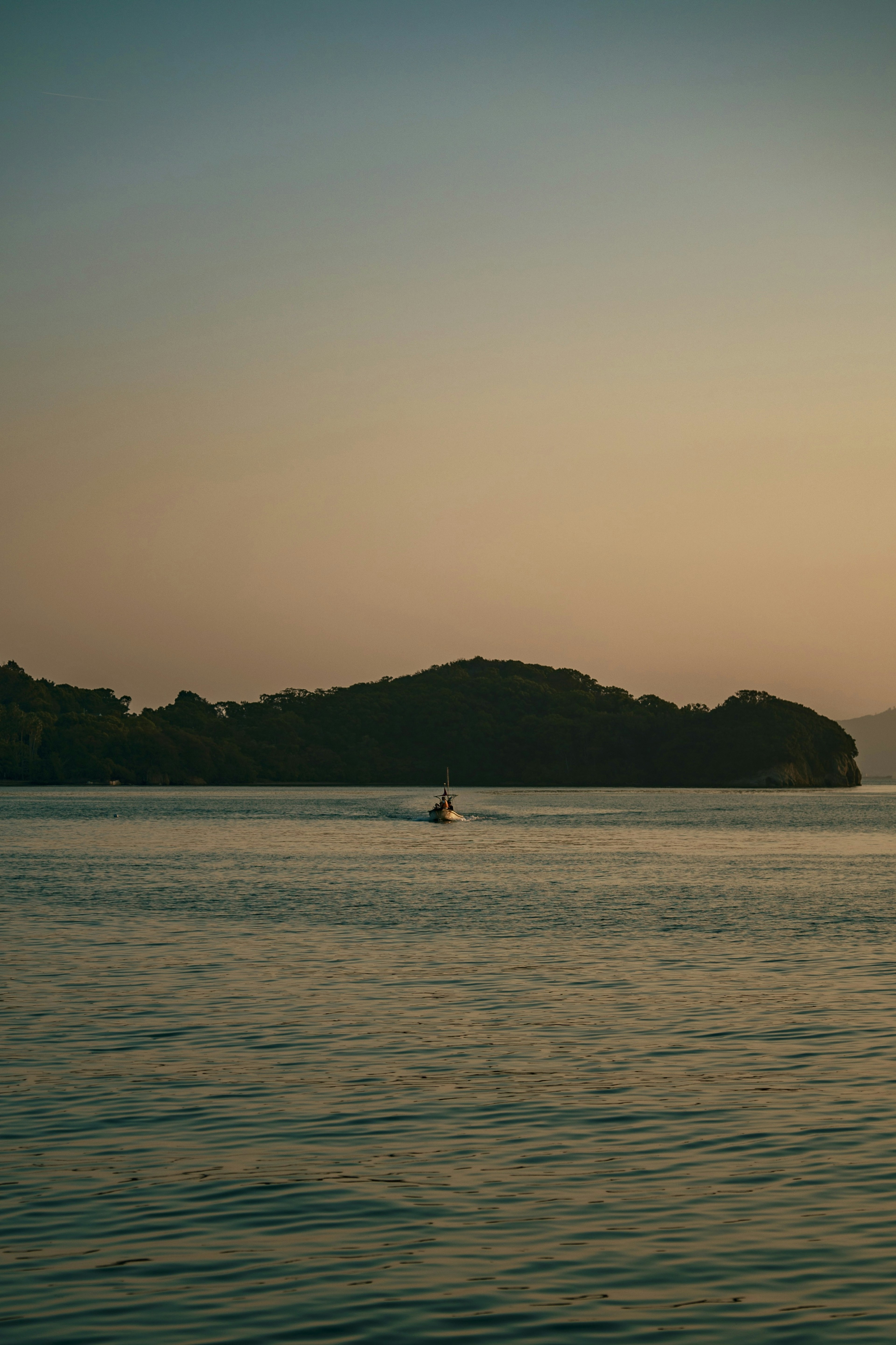 Calm sea and island view with soft evening light