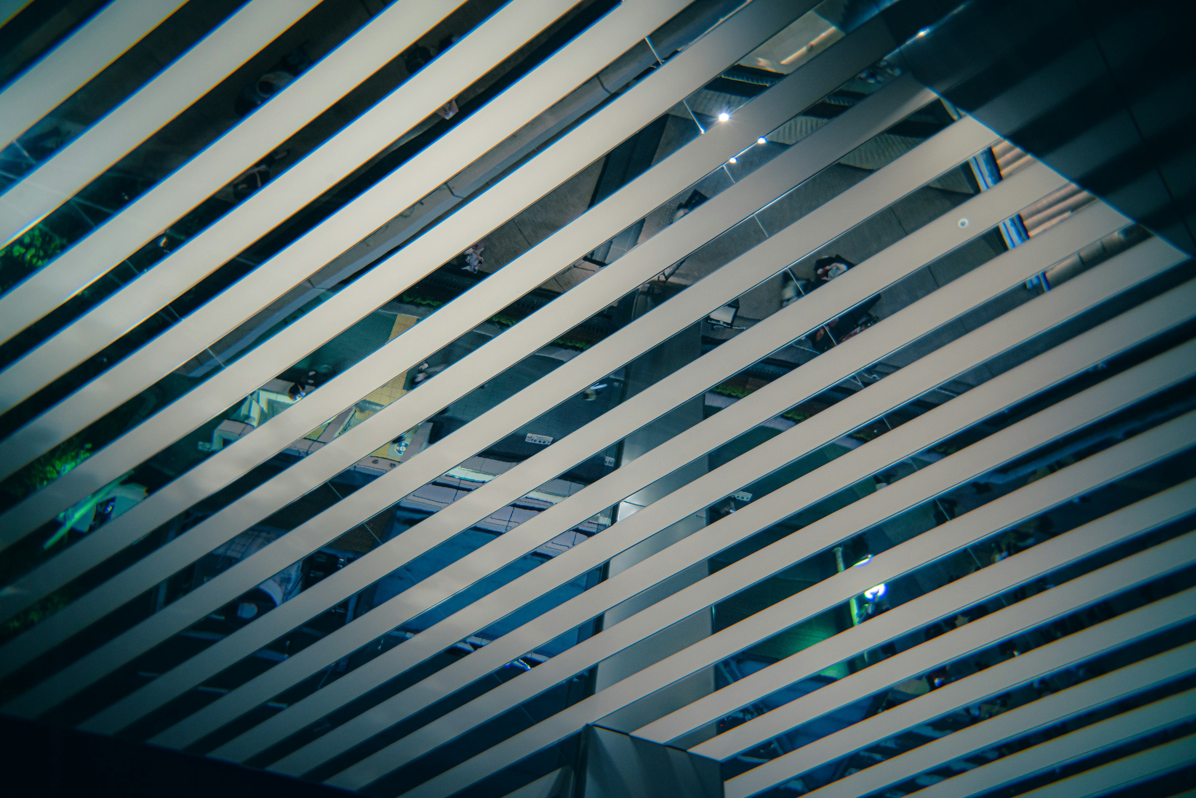 Light effects visible through intersecting lines of modern architectural interior