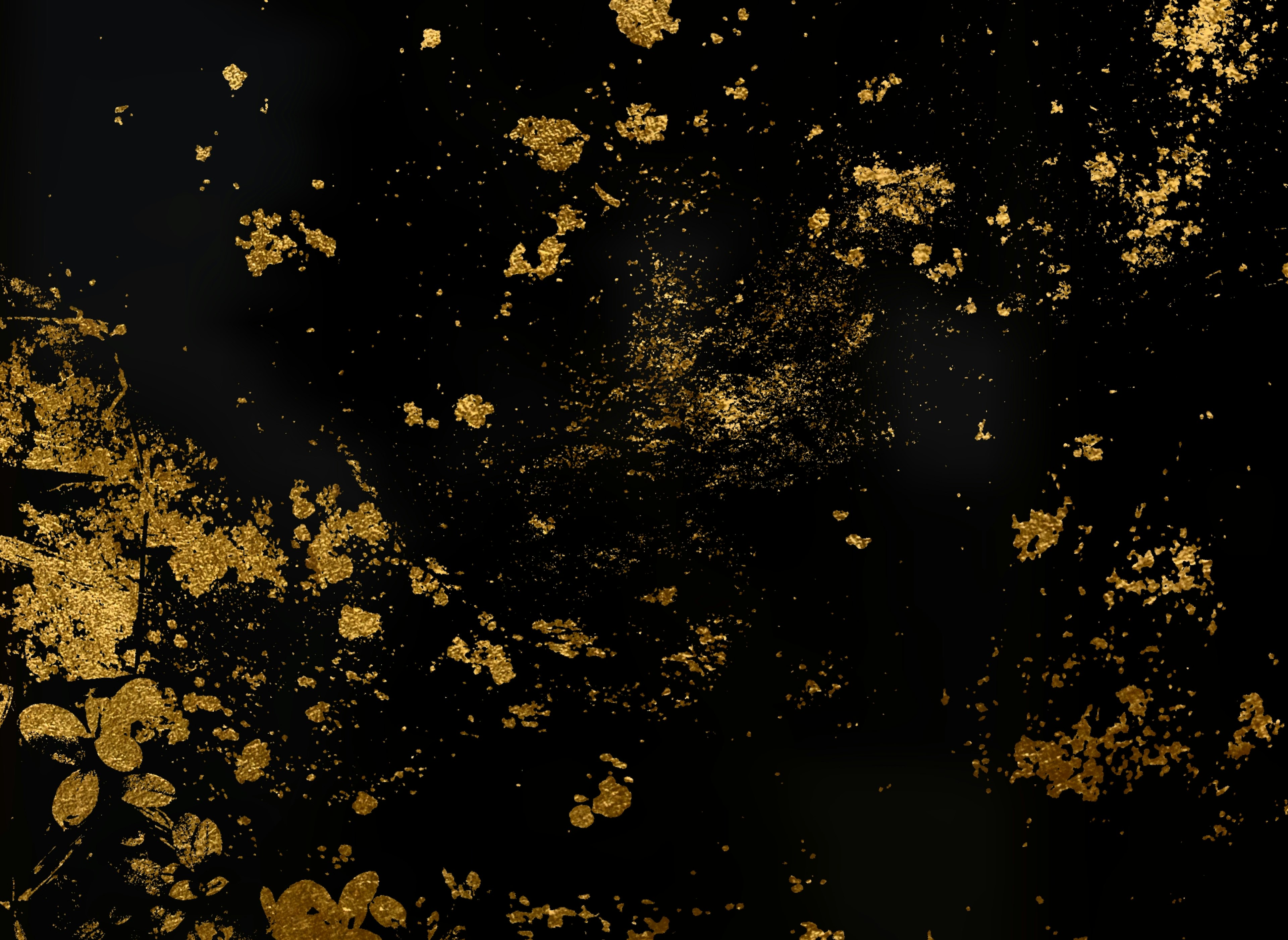 Gold dust scattered on a black background