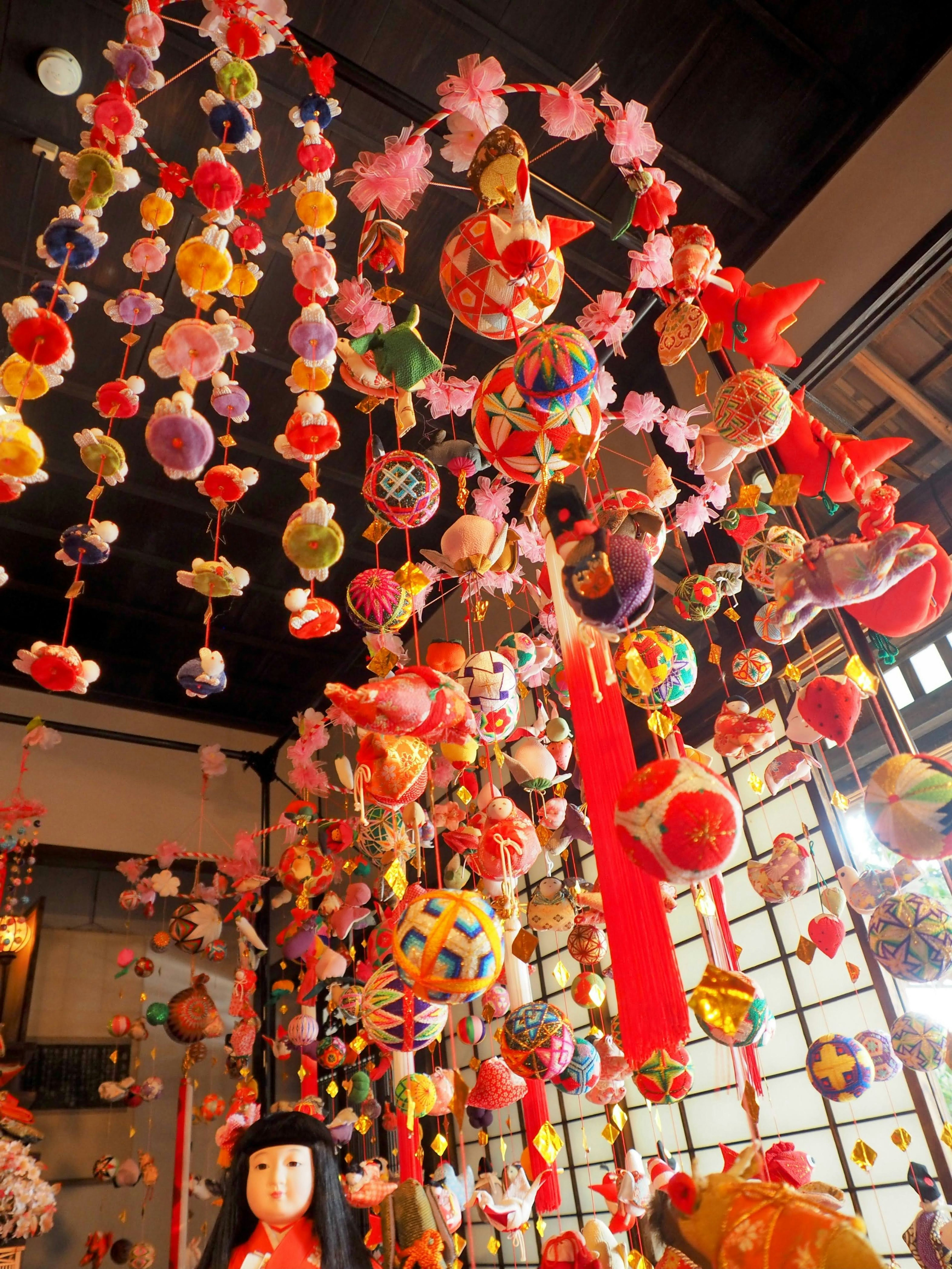 Colorful hanging decorations in an indoor setting