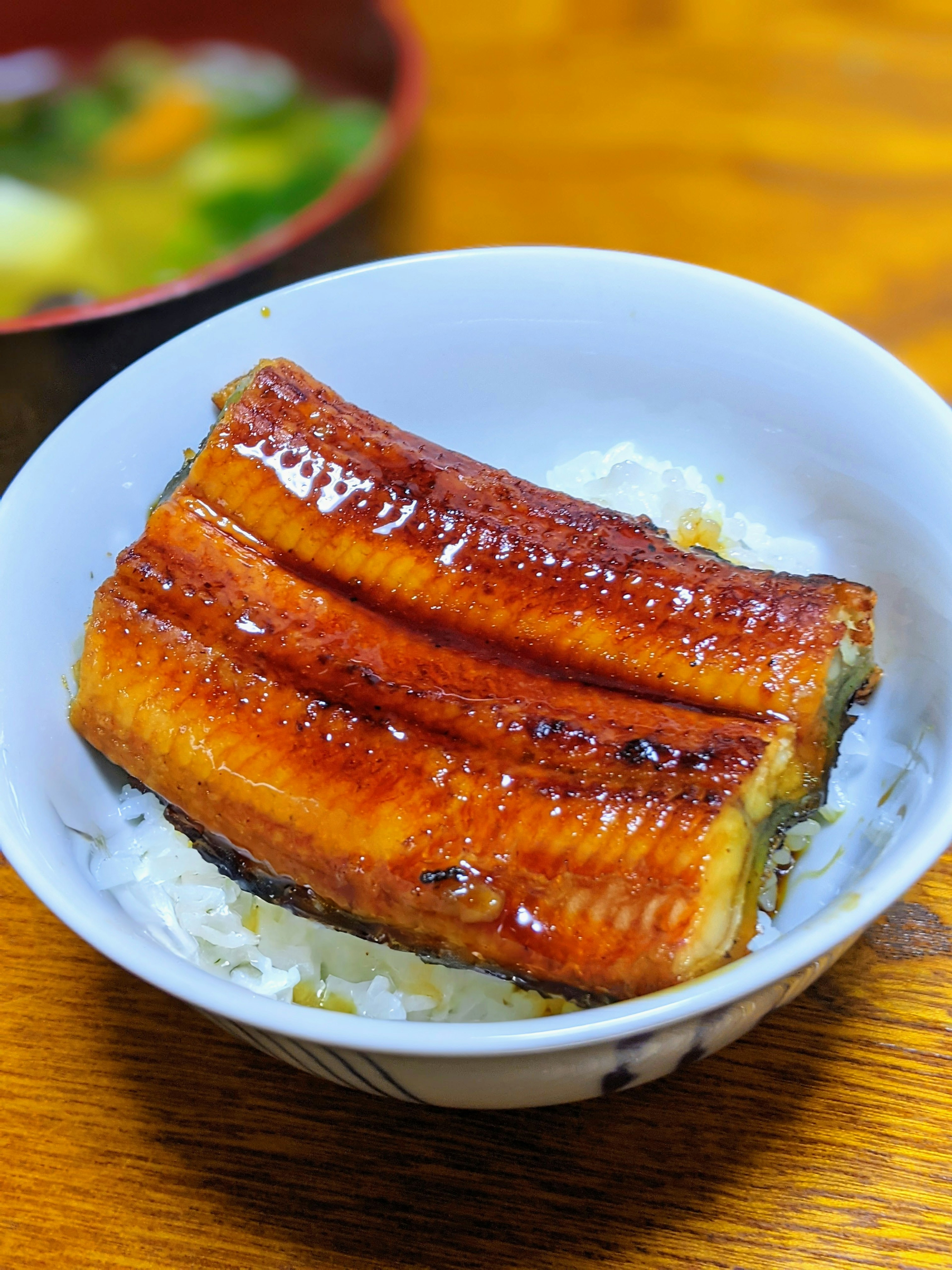 Grilled eel slice served over white rice