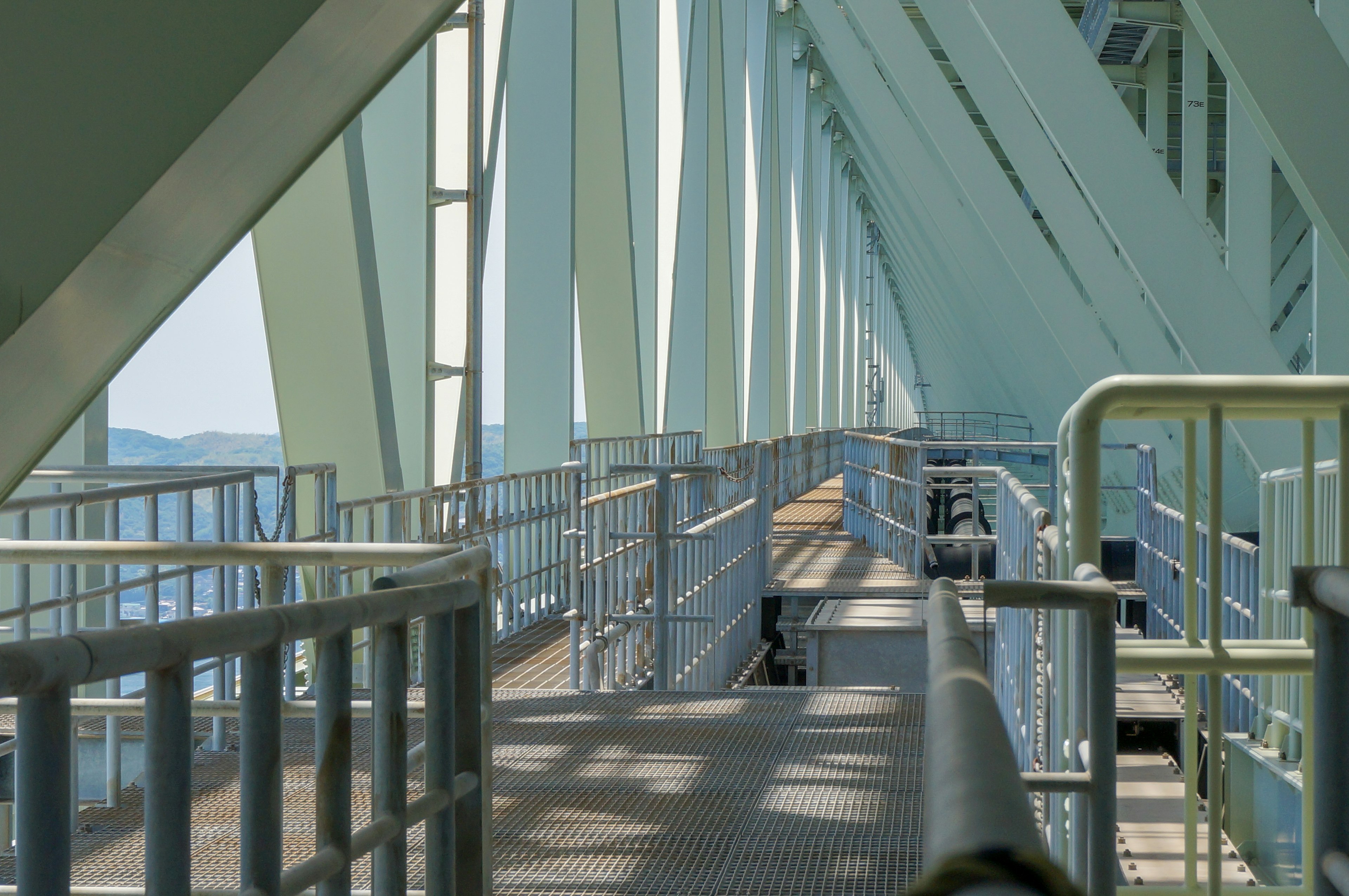 Photo of a walkway showcasing the internal structure of a bridge