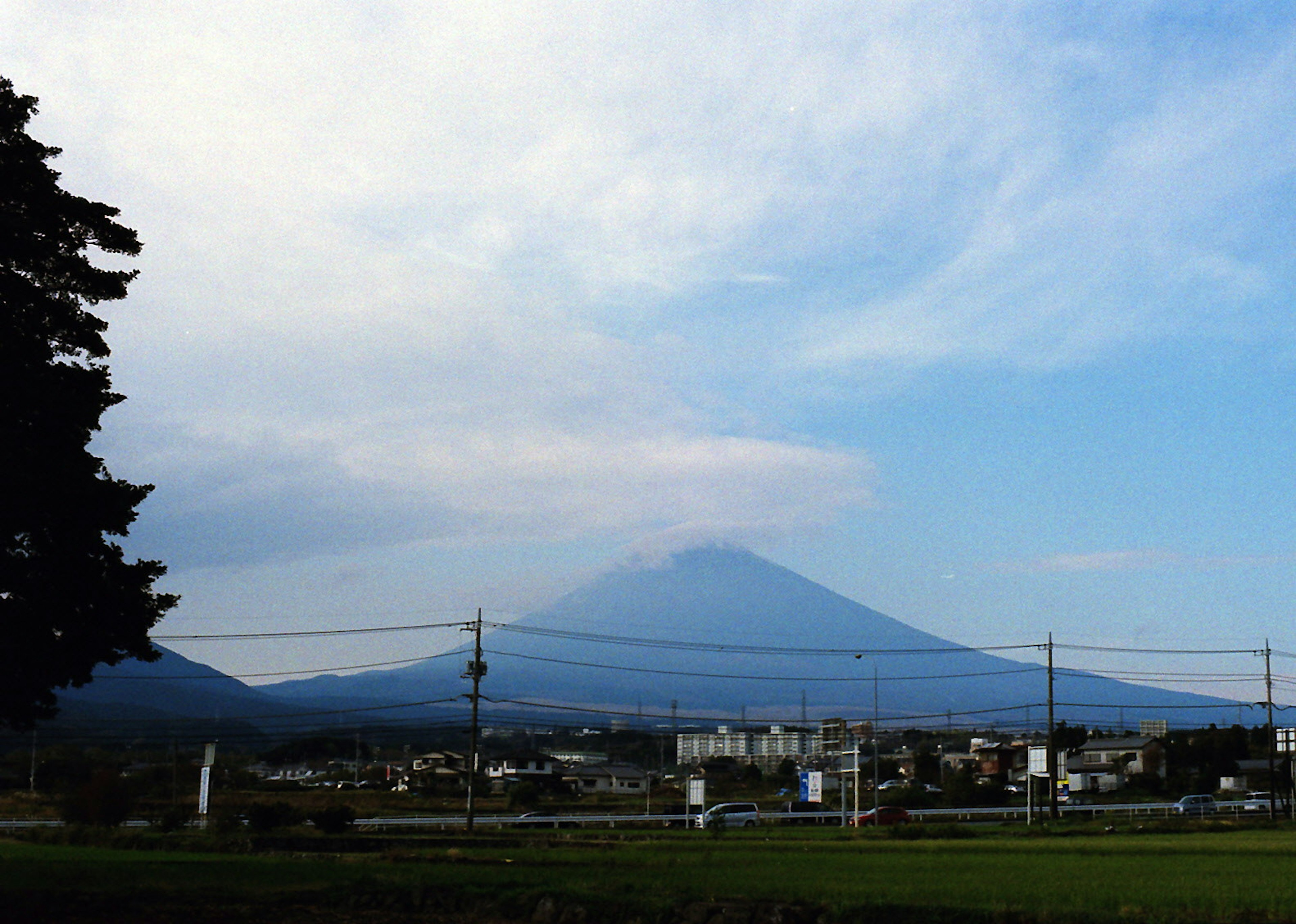 Scenic view of Mount Fuji against a blue sky