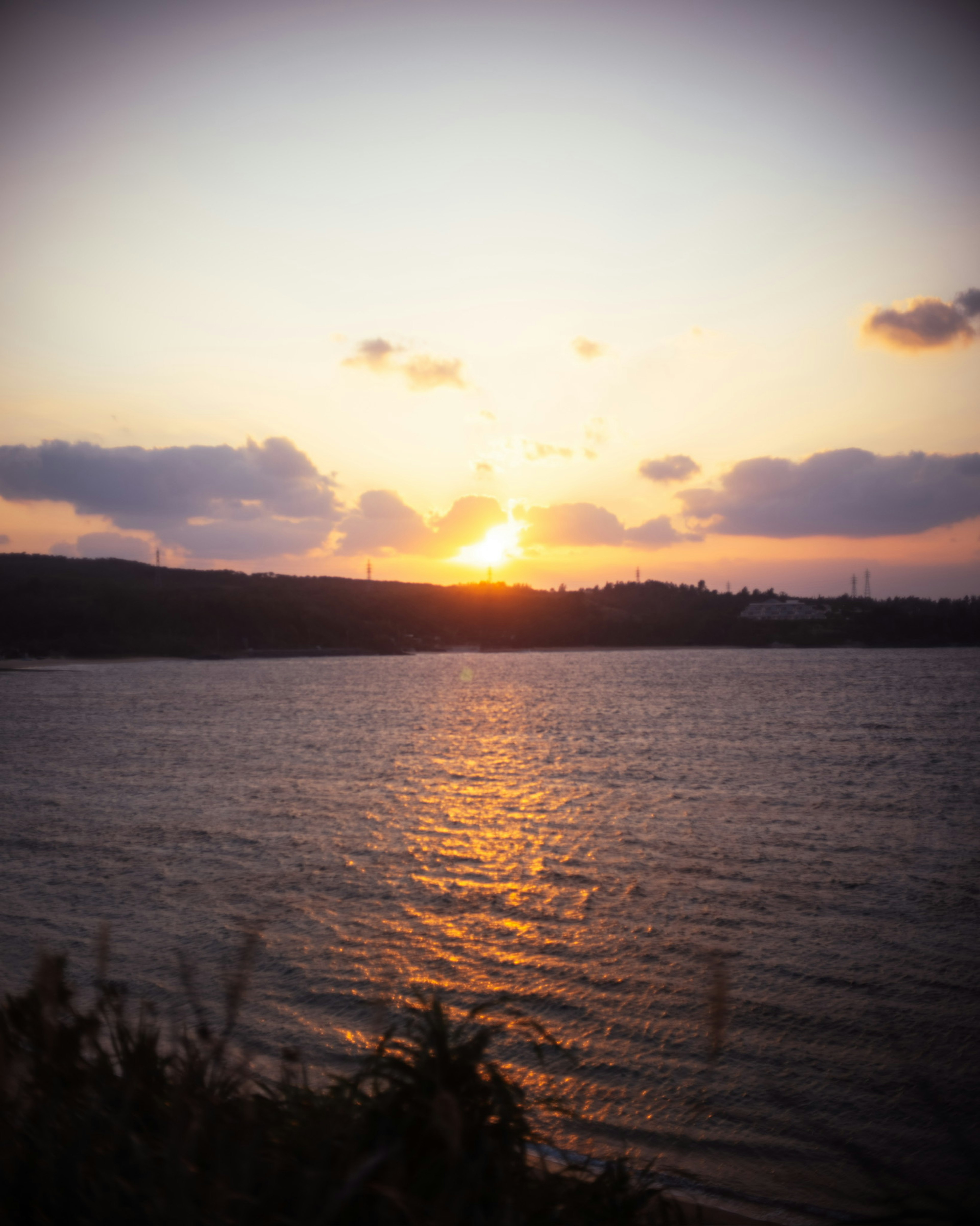 Beautiful landscape with sunset reflecting on water