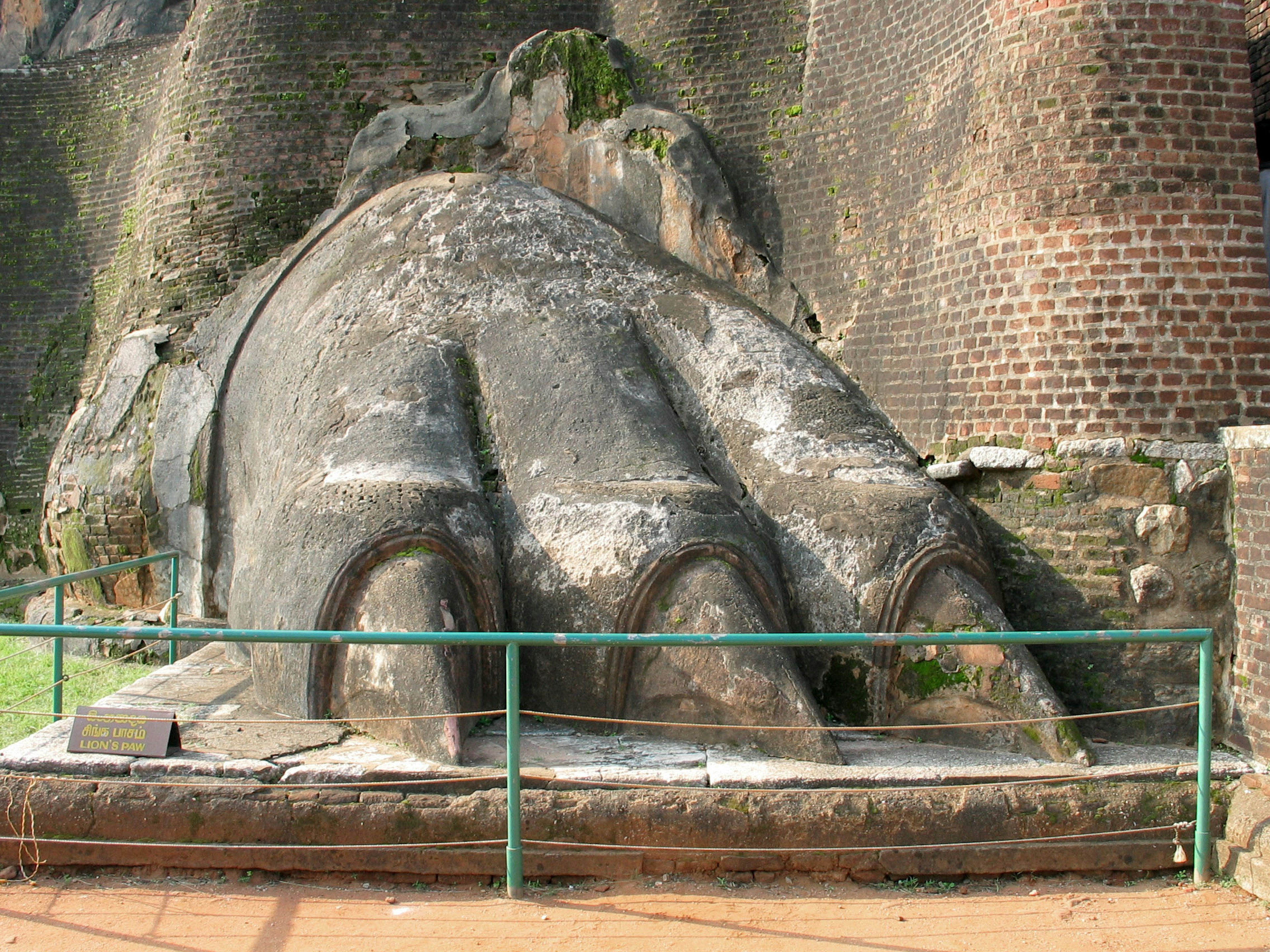 Large stone sculpture of a Buddha's foot