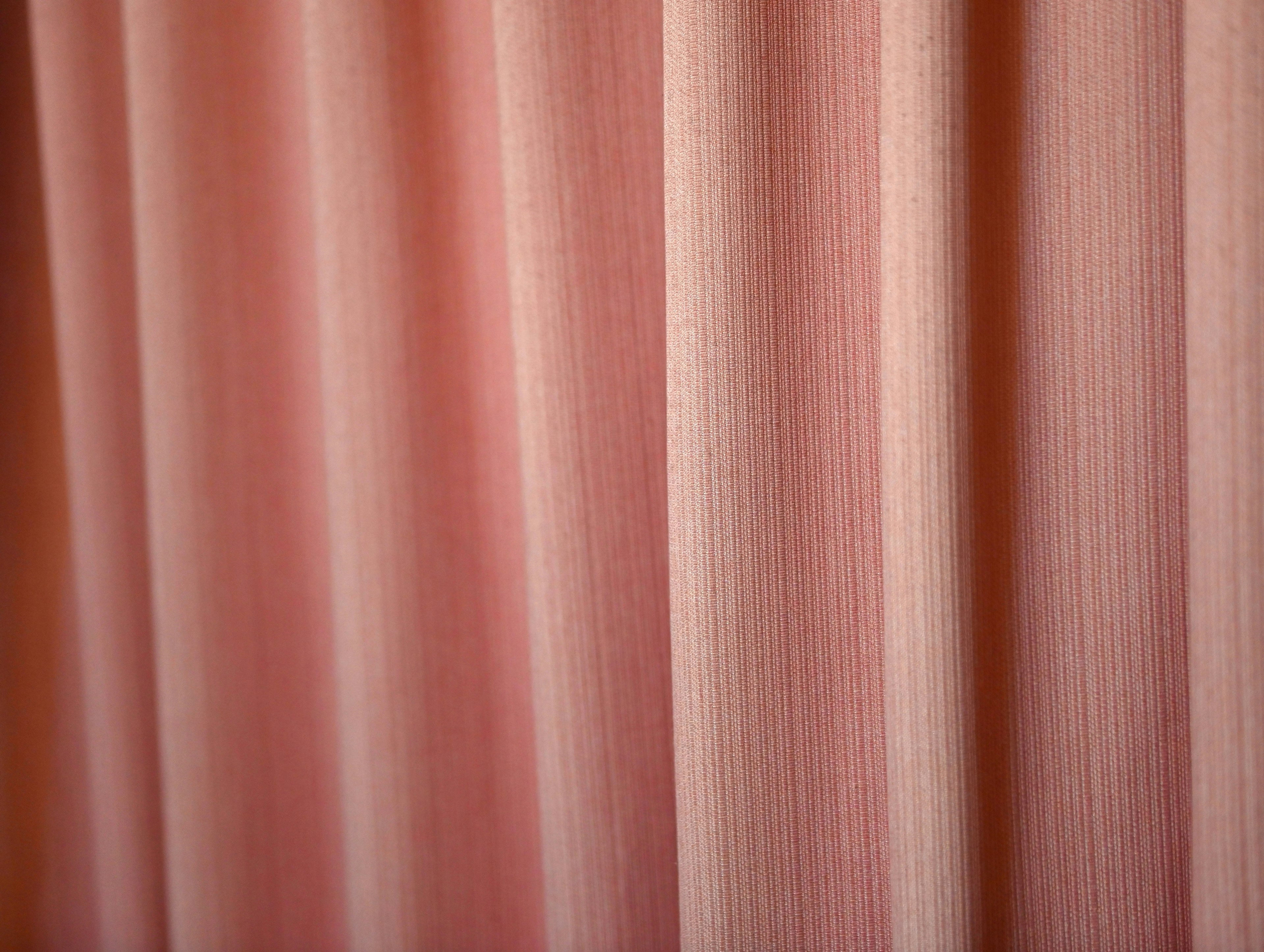 Textured light pink curtain fabric