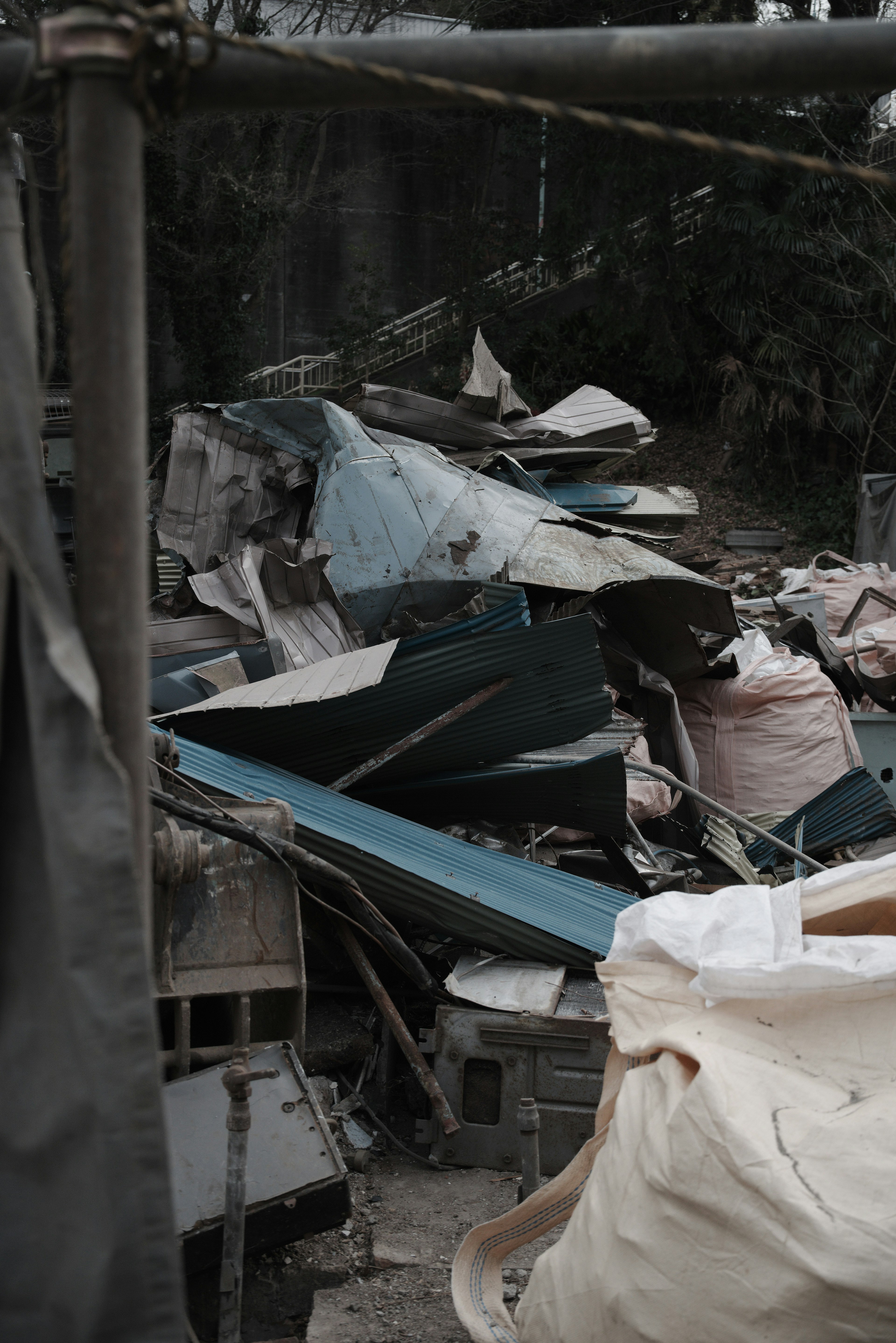 A pile of debris and scattered broken furniture