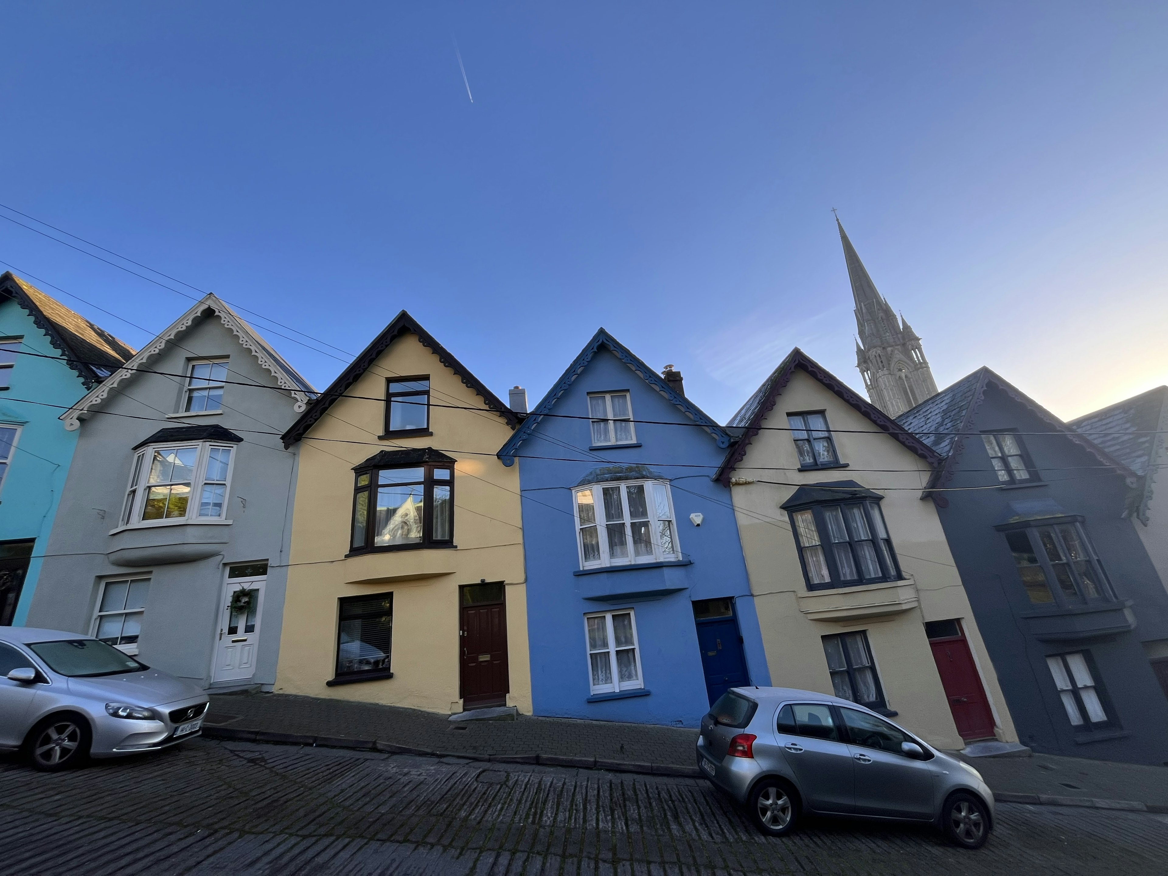 Colorful row of houses on a sloped street