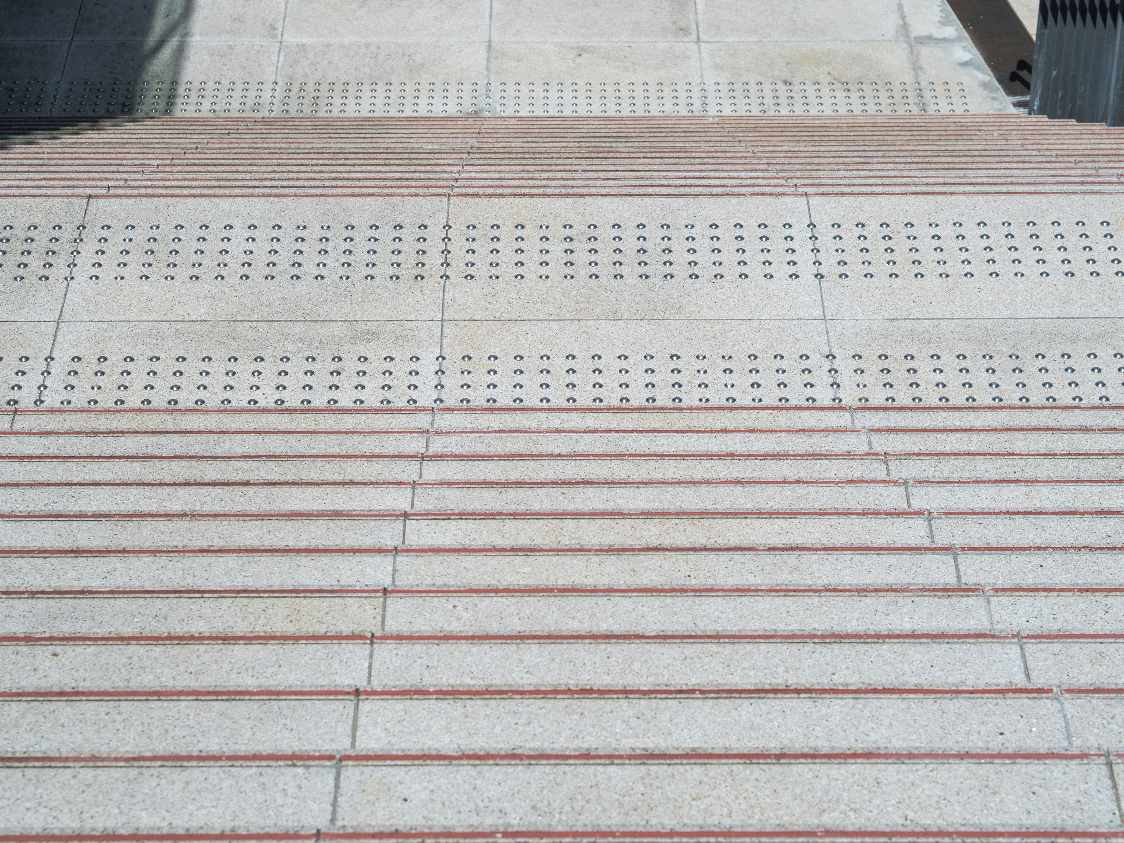 Textured stone slope with patterns on the steps