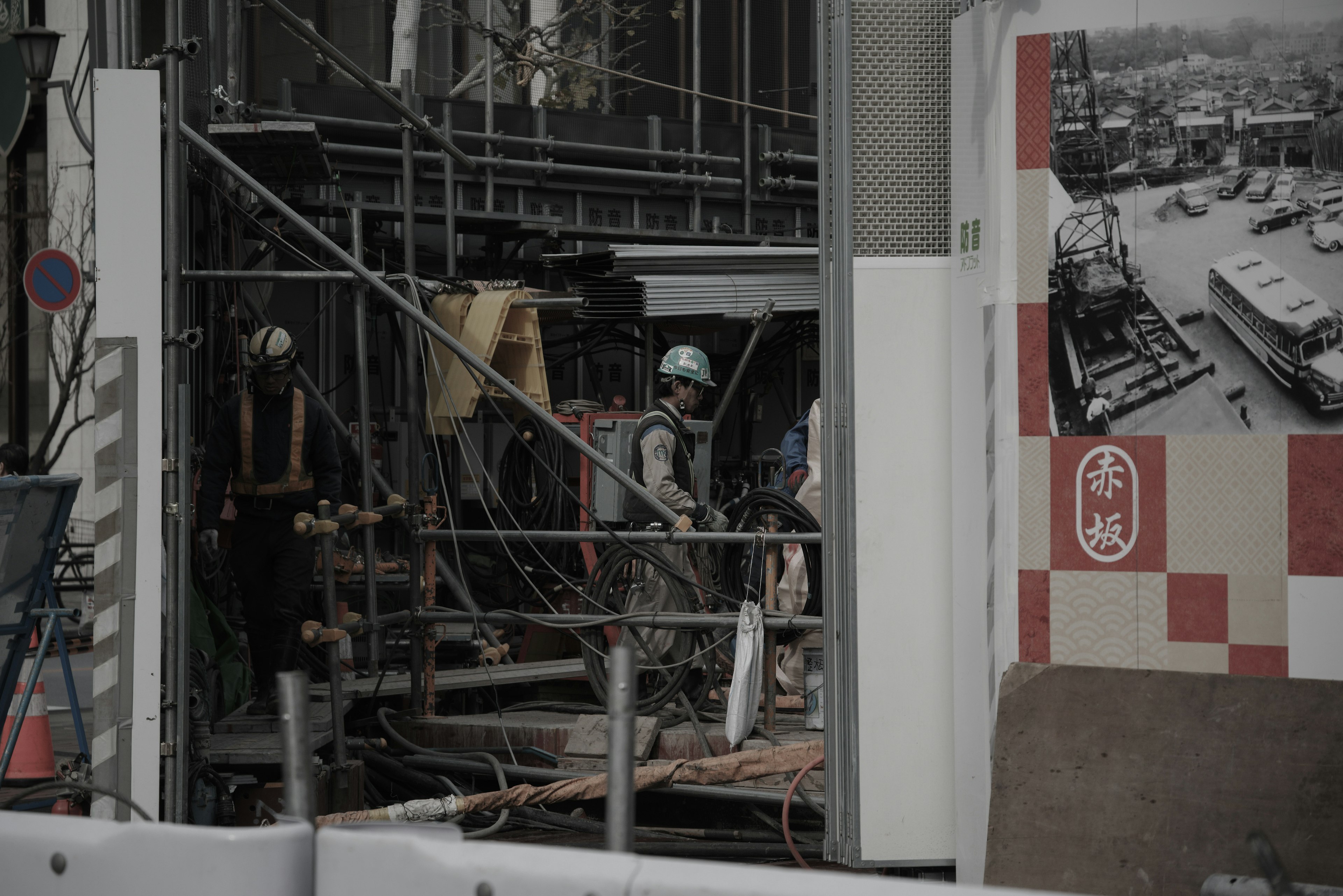 Construction site with workers and scaffolding