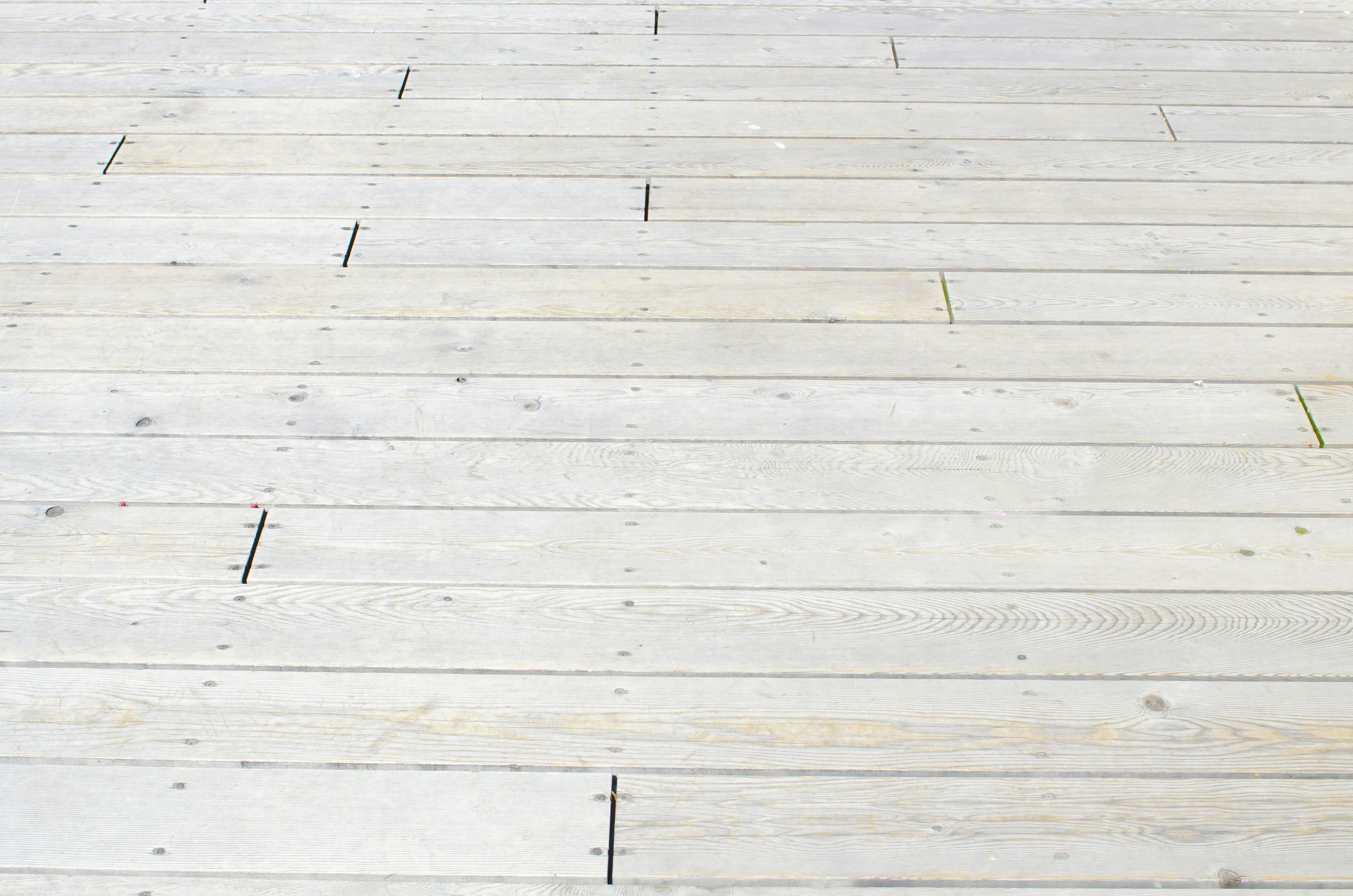 Textured white wooden flooring