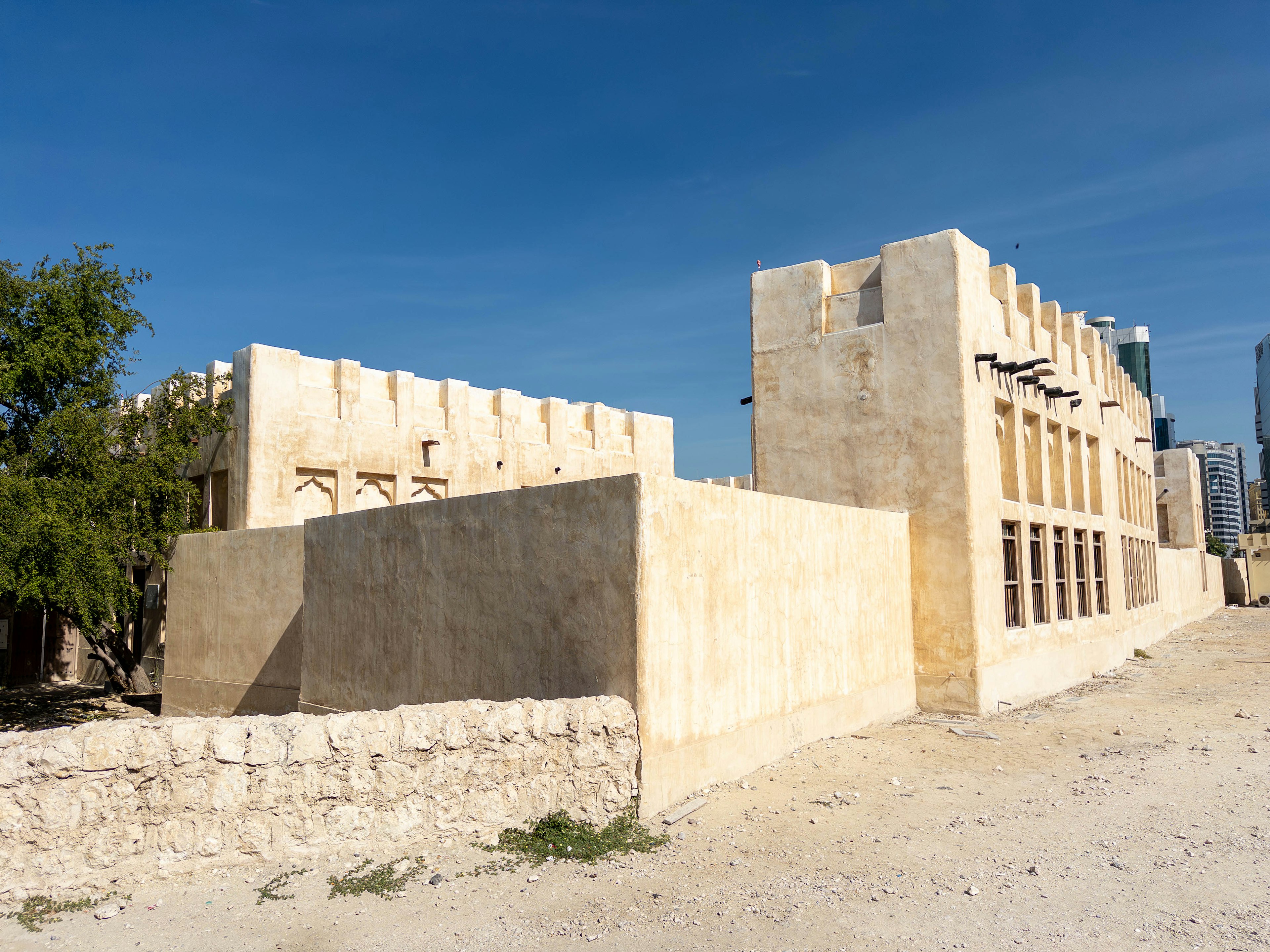 Sandstone buildings under a blue sky