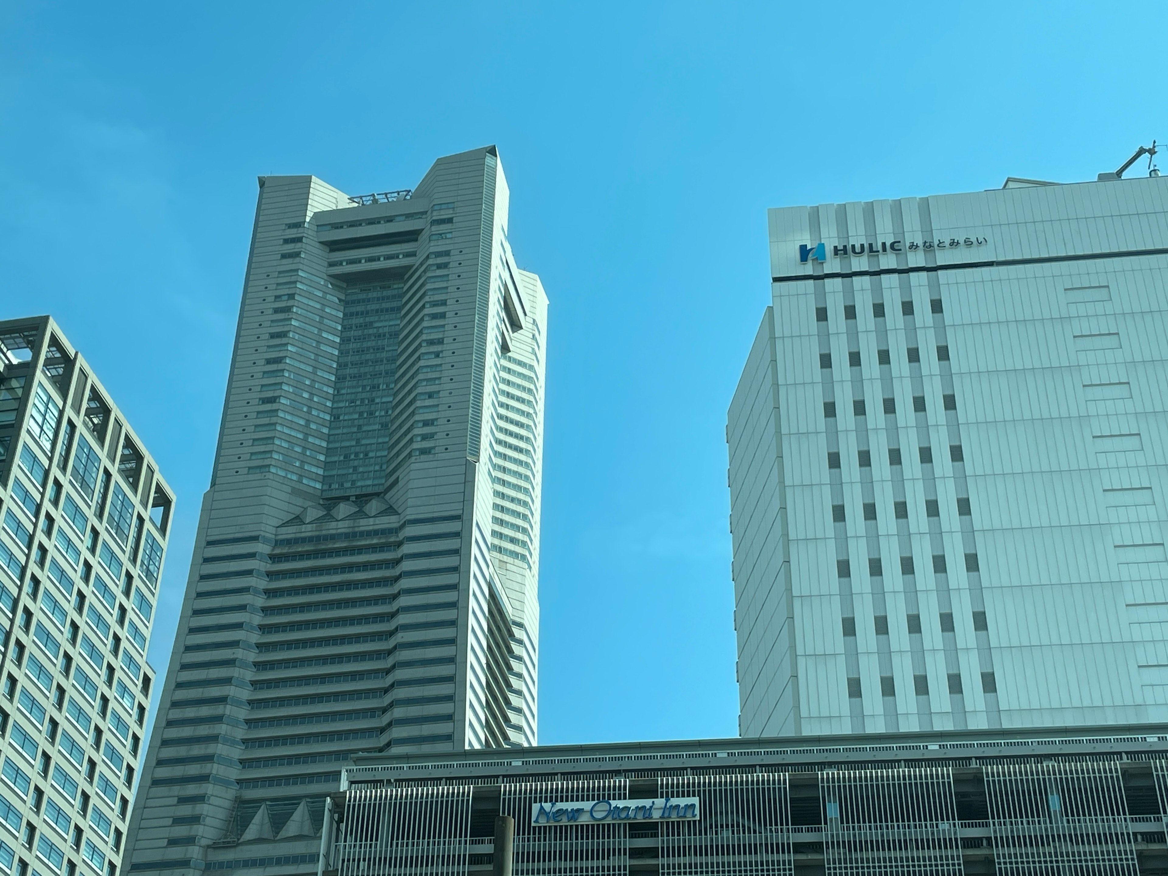 Tall skyscrapers against a clear blue sky