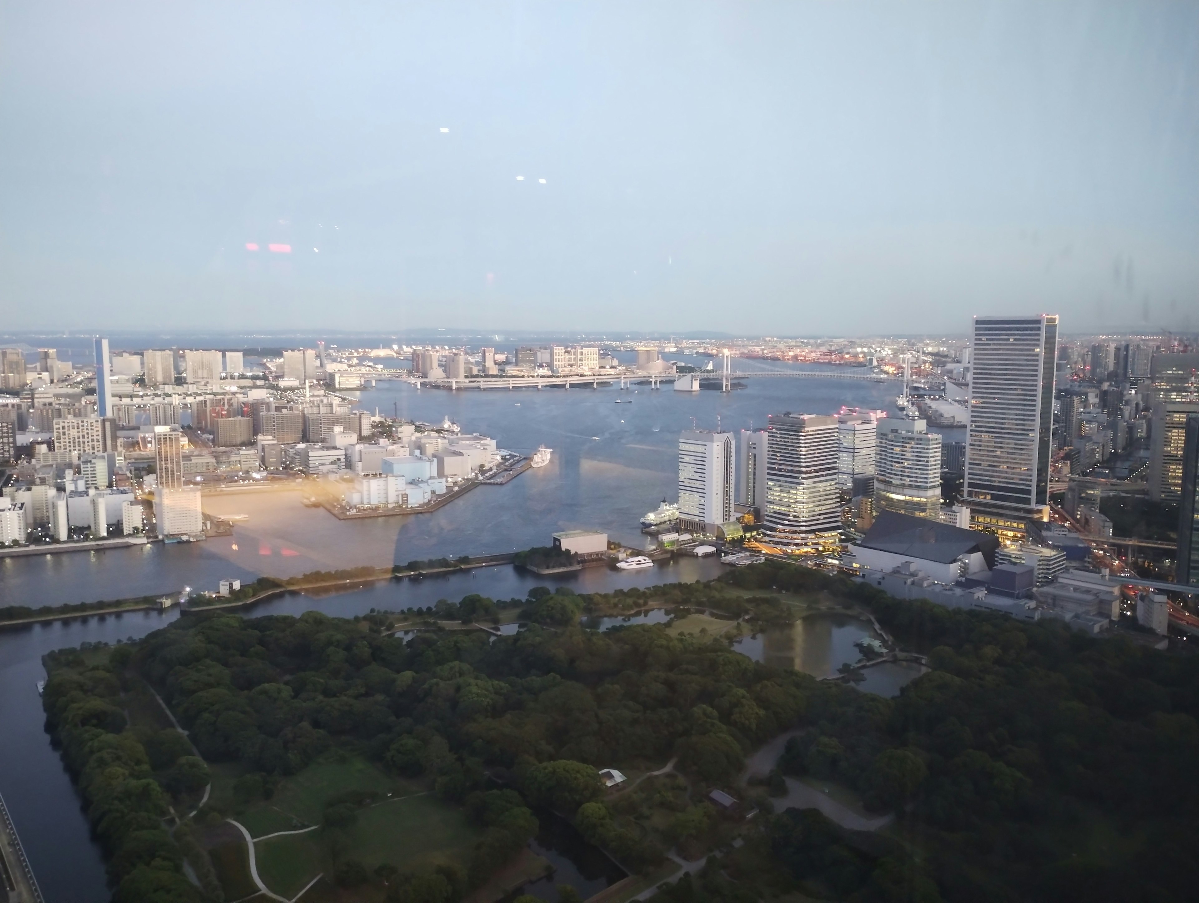 A scenic view of skyscrapers and a river