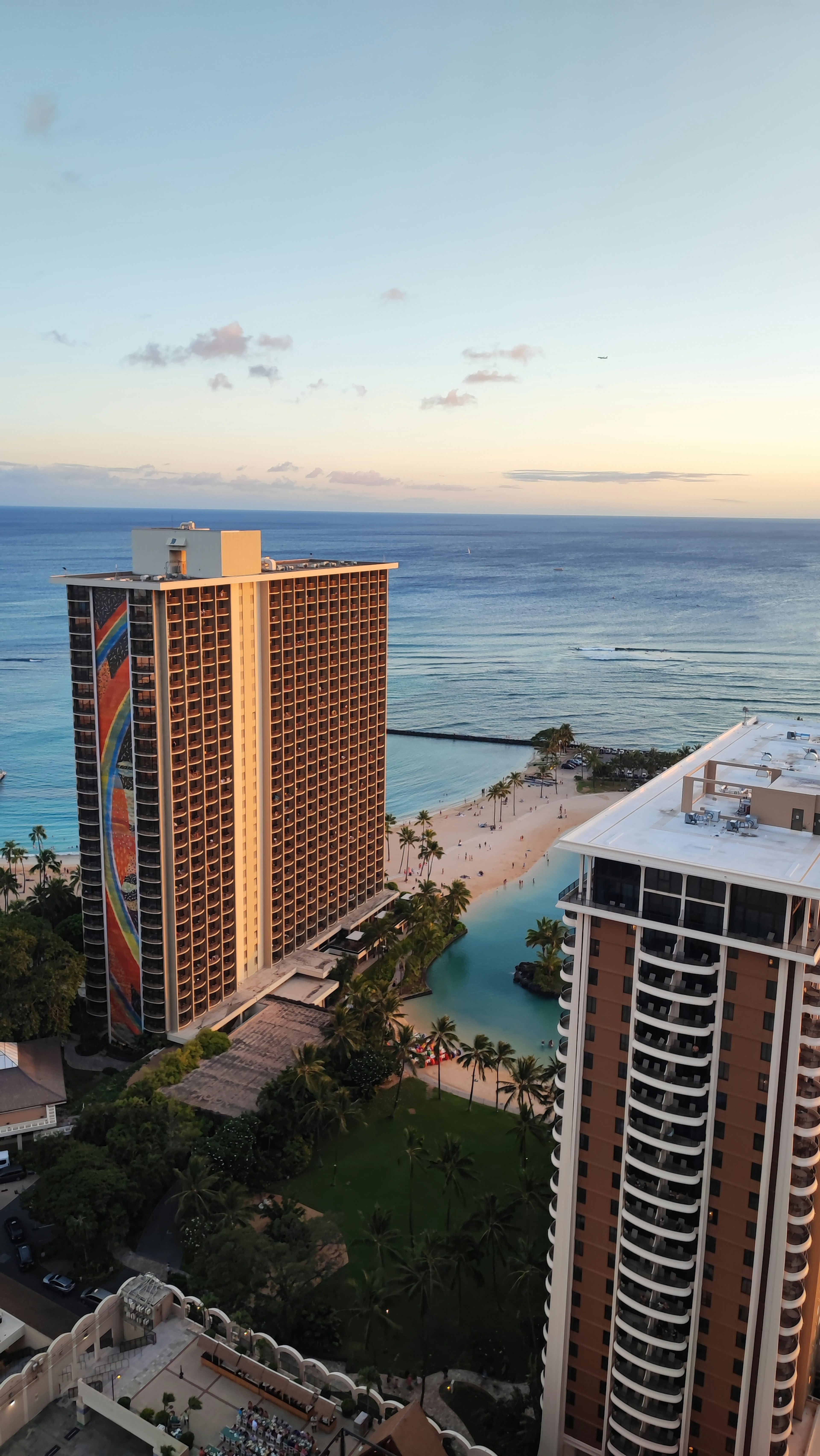 Panoramic view of tall buildings and the ocean in Honolulu