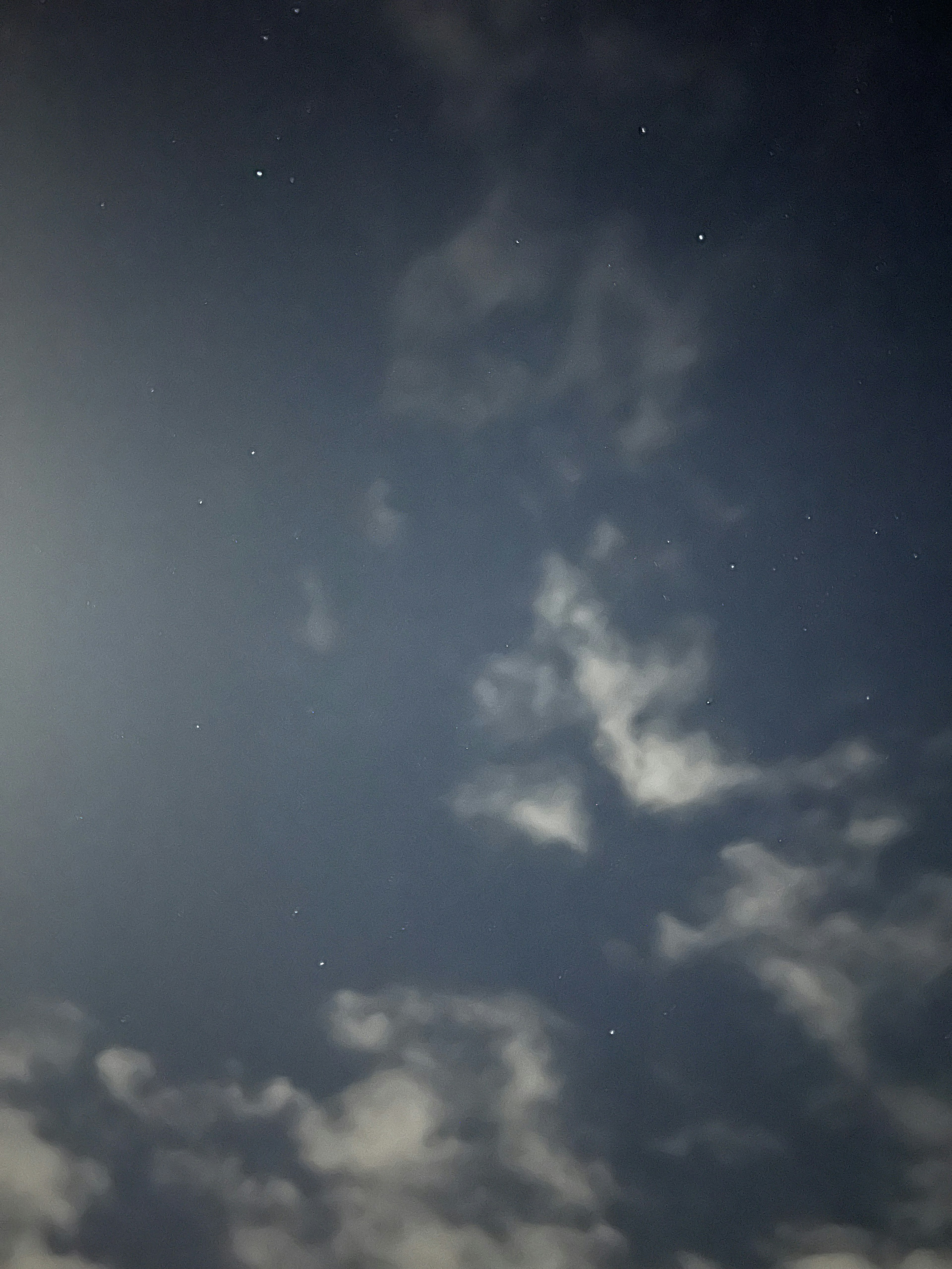 Night sky with clouds and stars