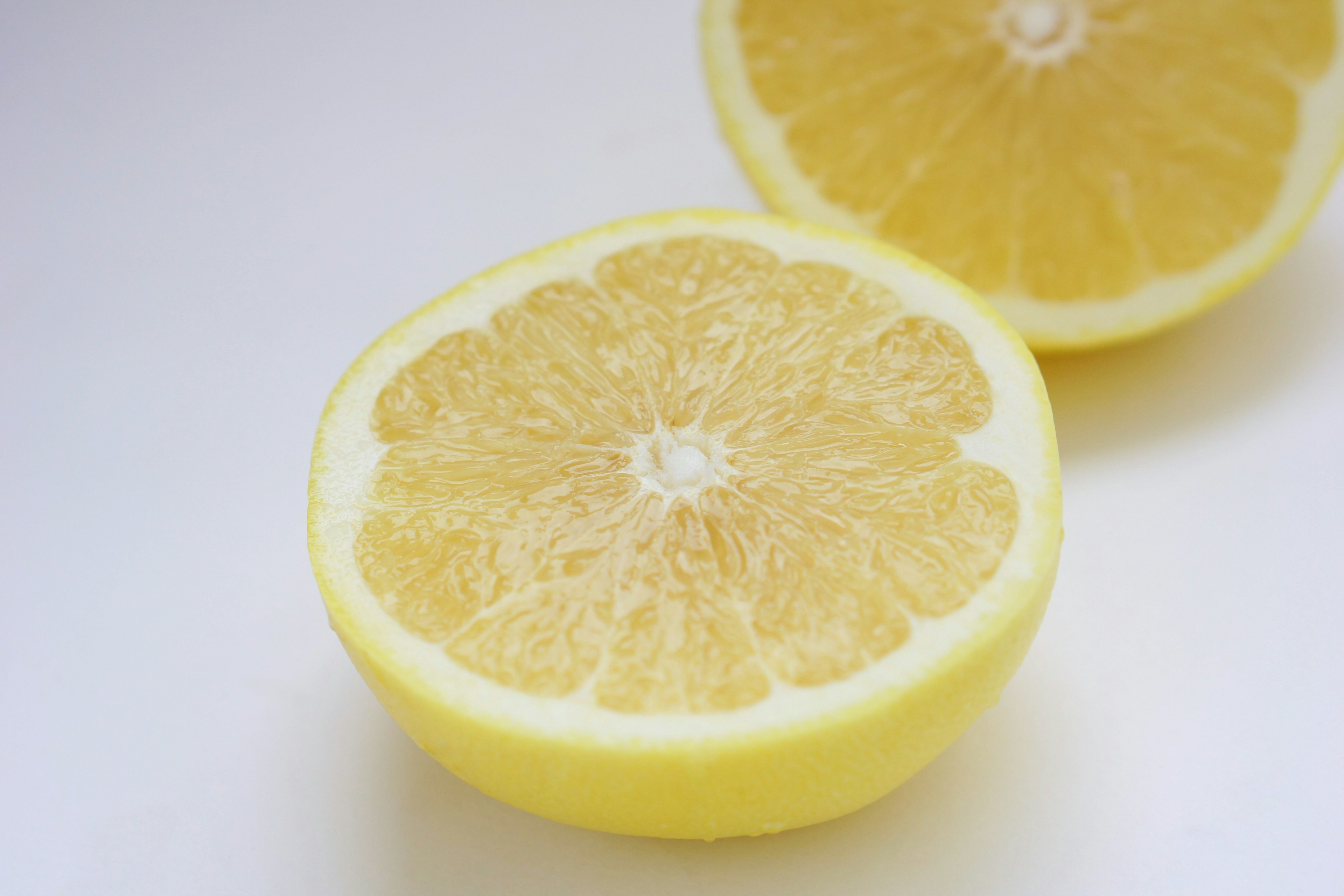 Freshly cut lemon showcasing vibrant yellow flesh