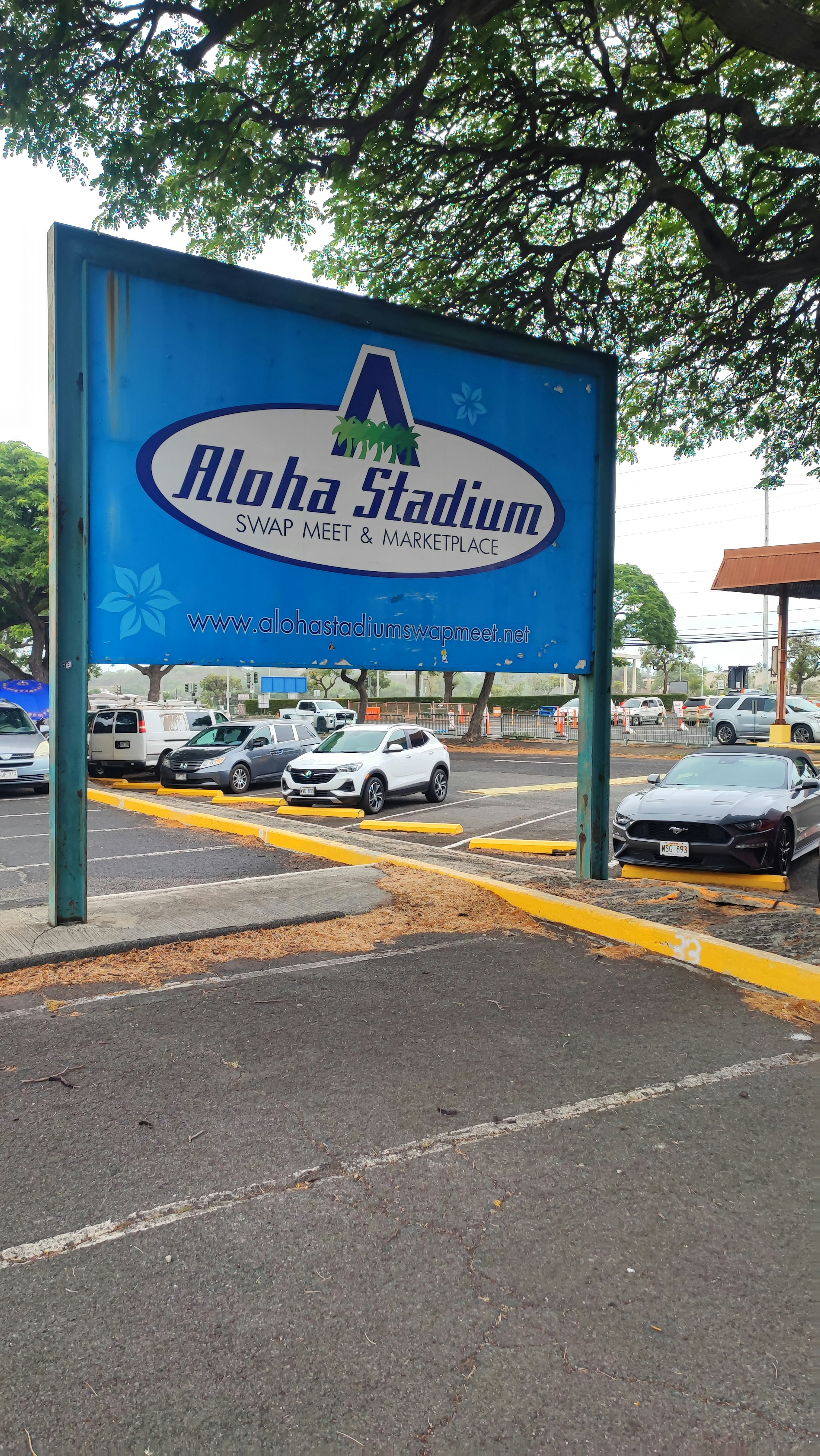 Aloha Stadium sign displayed on a blue background