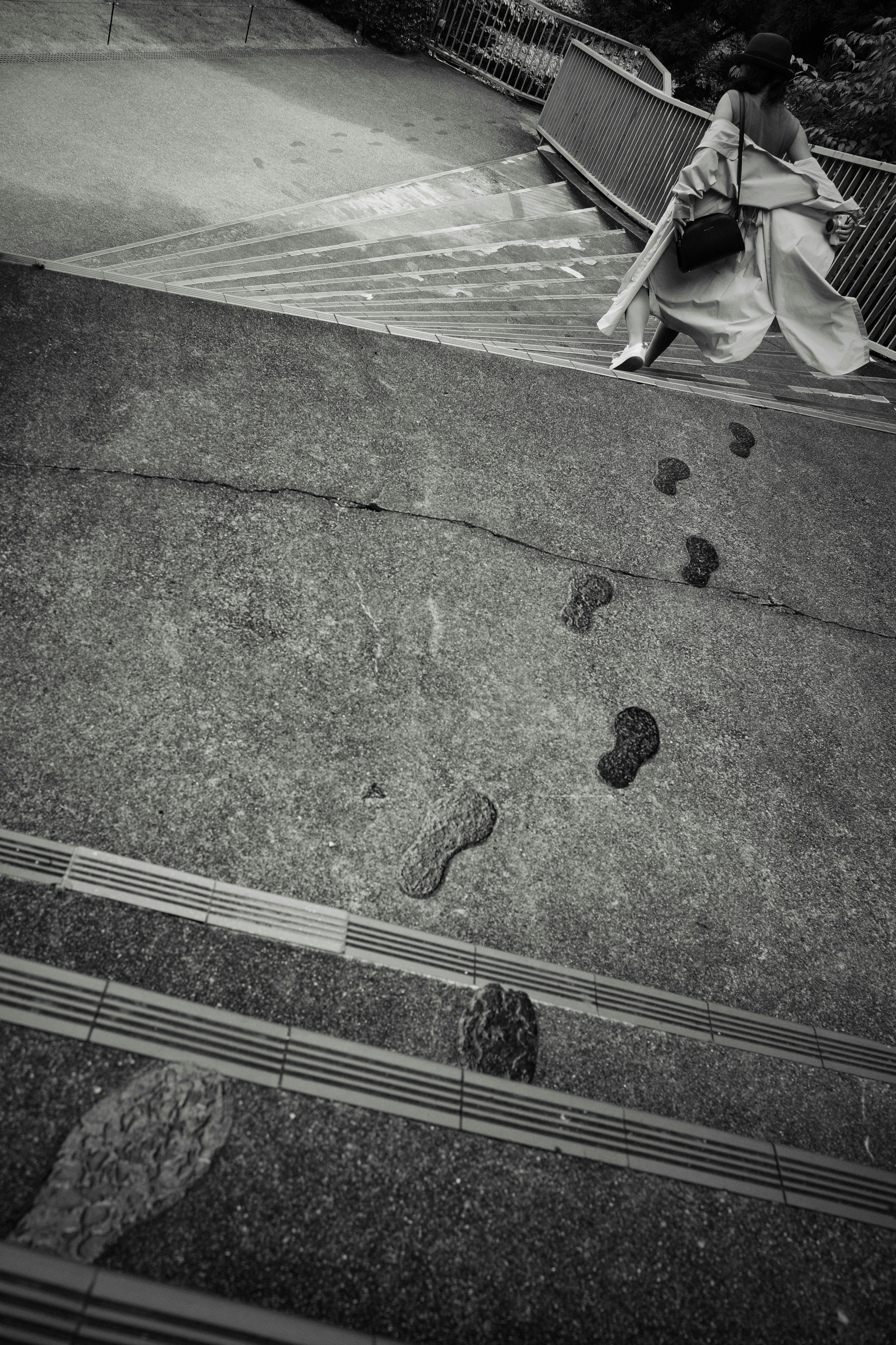 Footprints on stairs with surrounding scenery