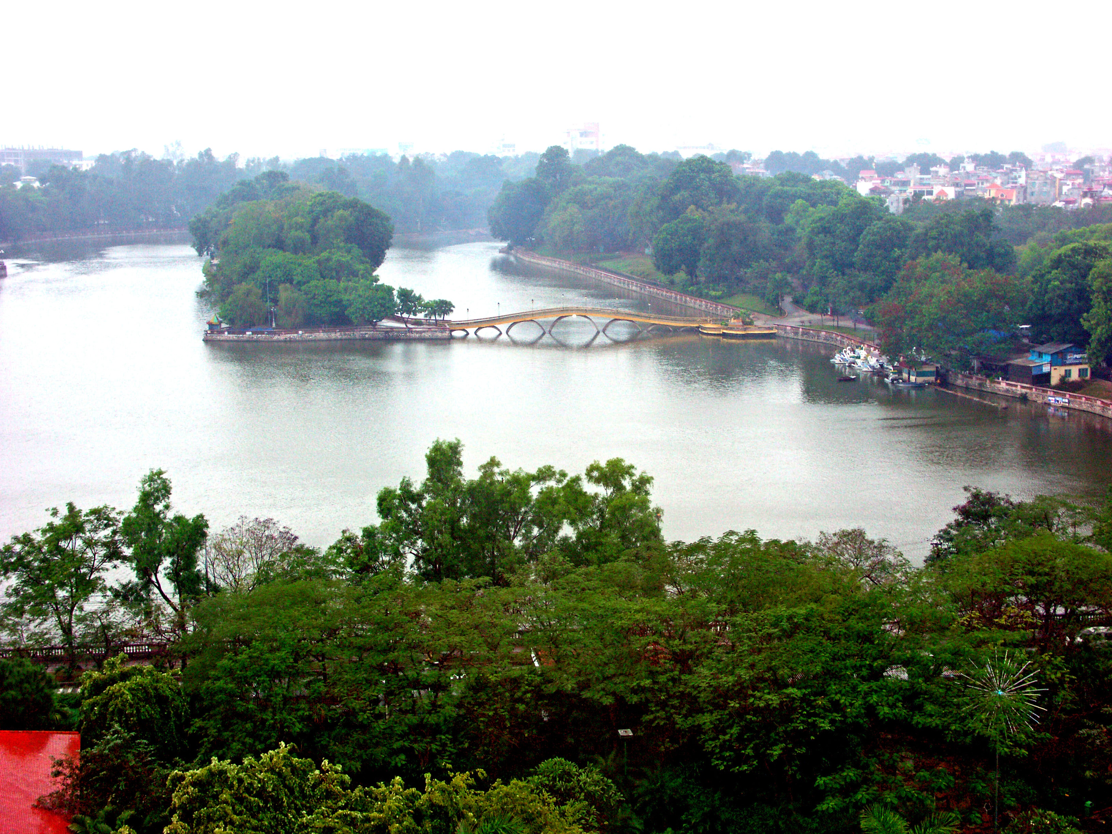 Lush landscape featuring a river and a bridge