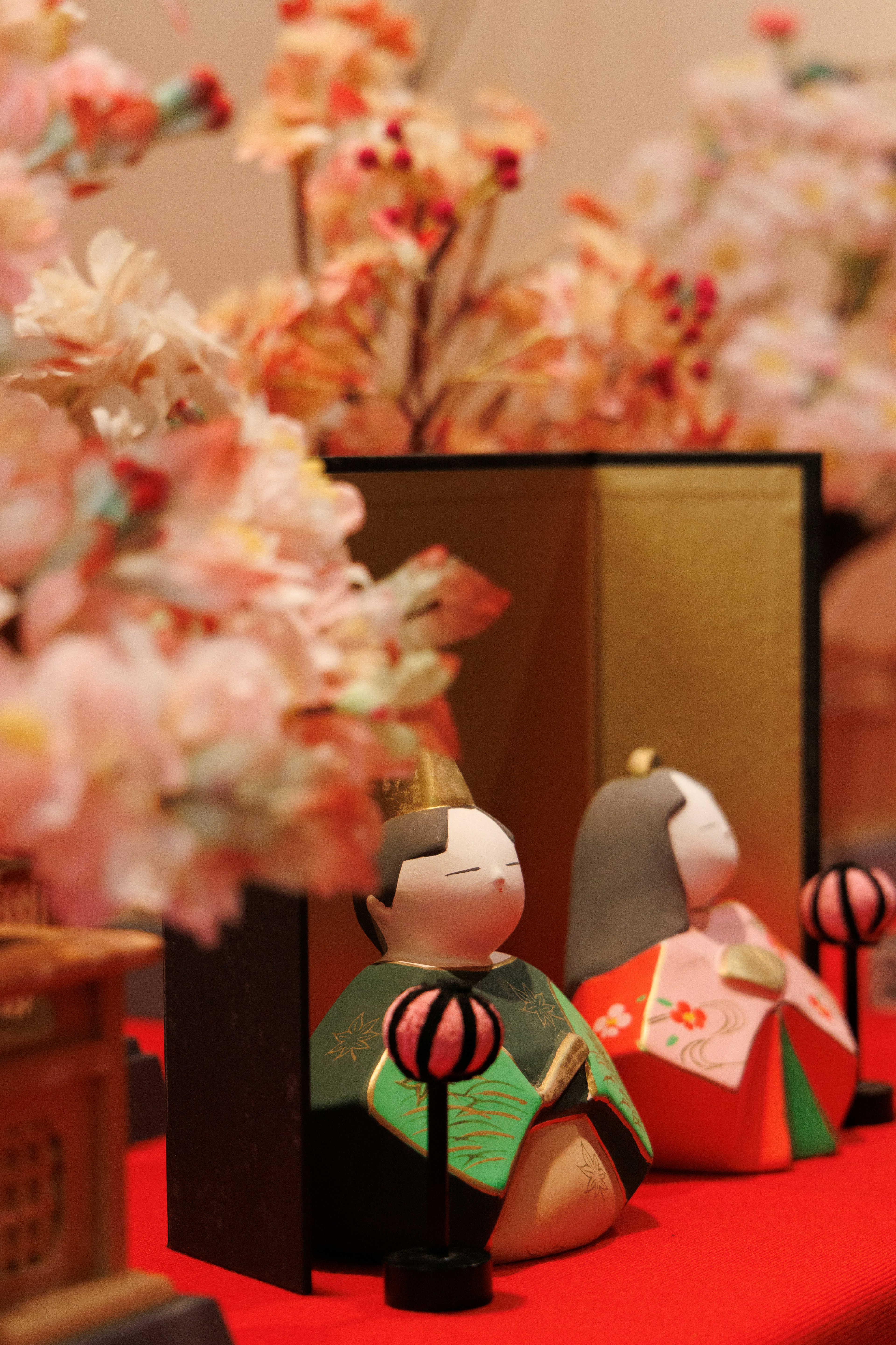 Beautiful display of Hina Matsuri dolls with cherry blossoms