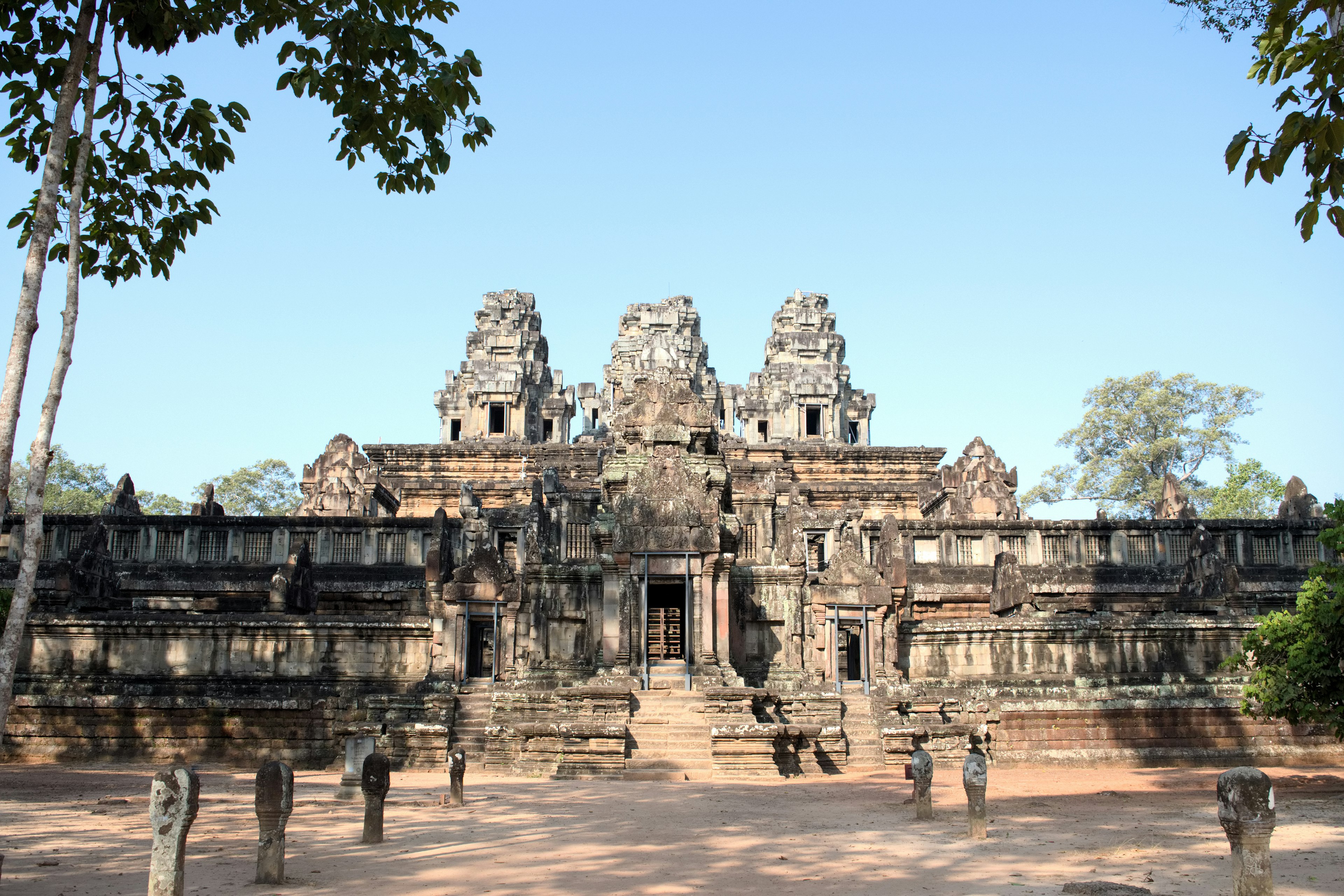 Majestic temple ruins in Cambodia with clear blue sky