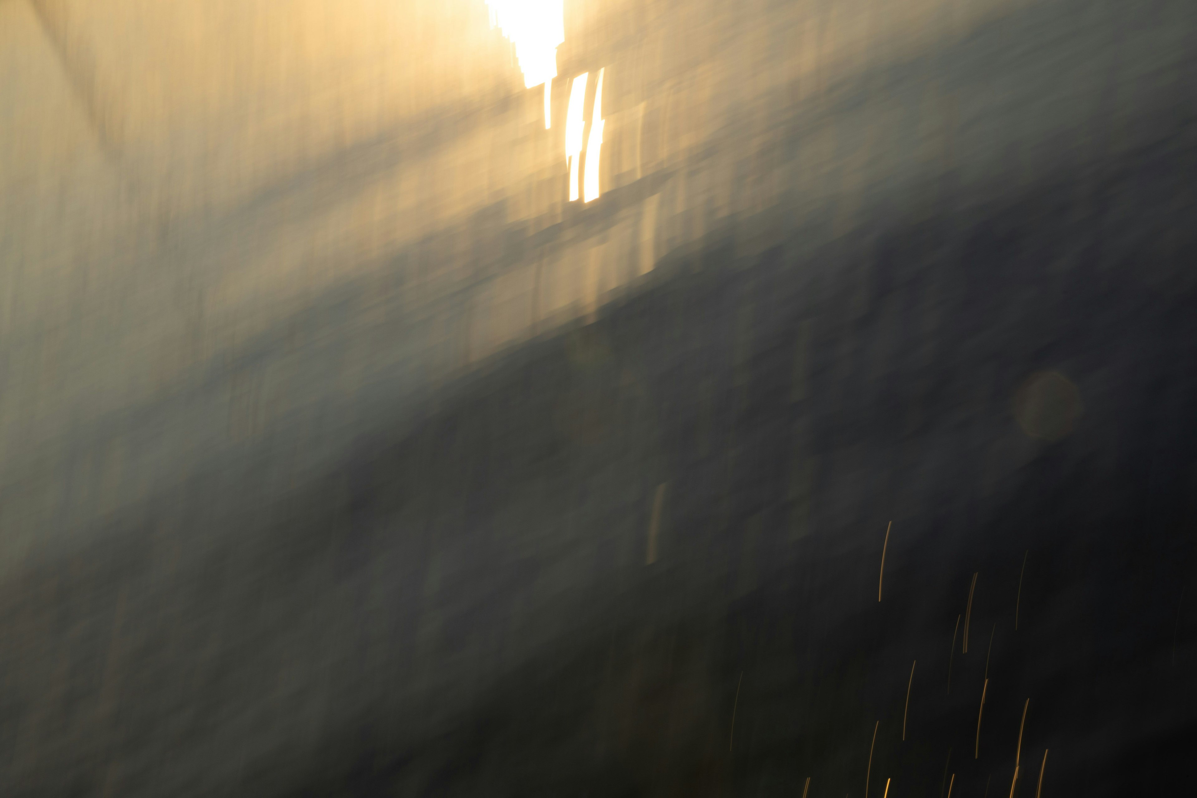 Abstract image featuring light reflections and a blurred background