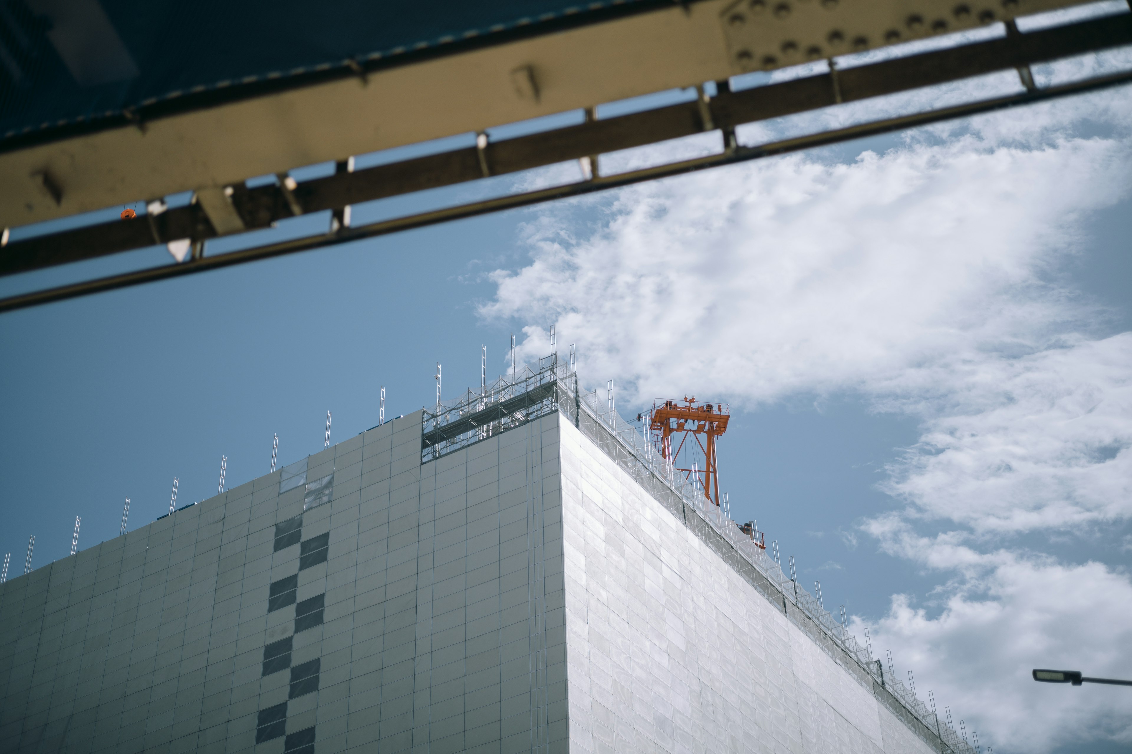 Image showing a building facade and part of a blue sky