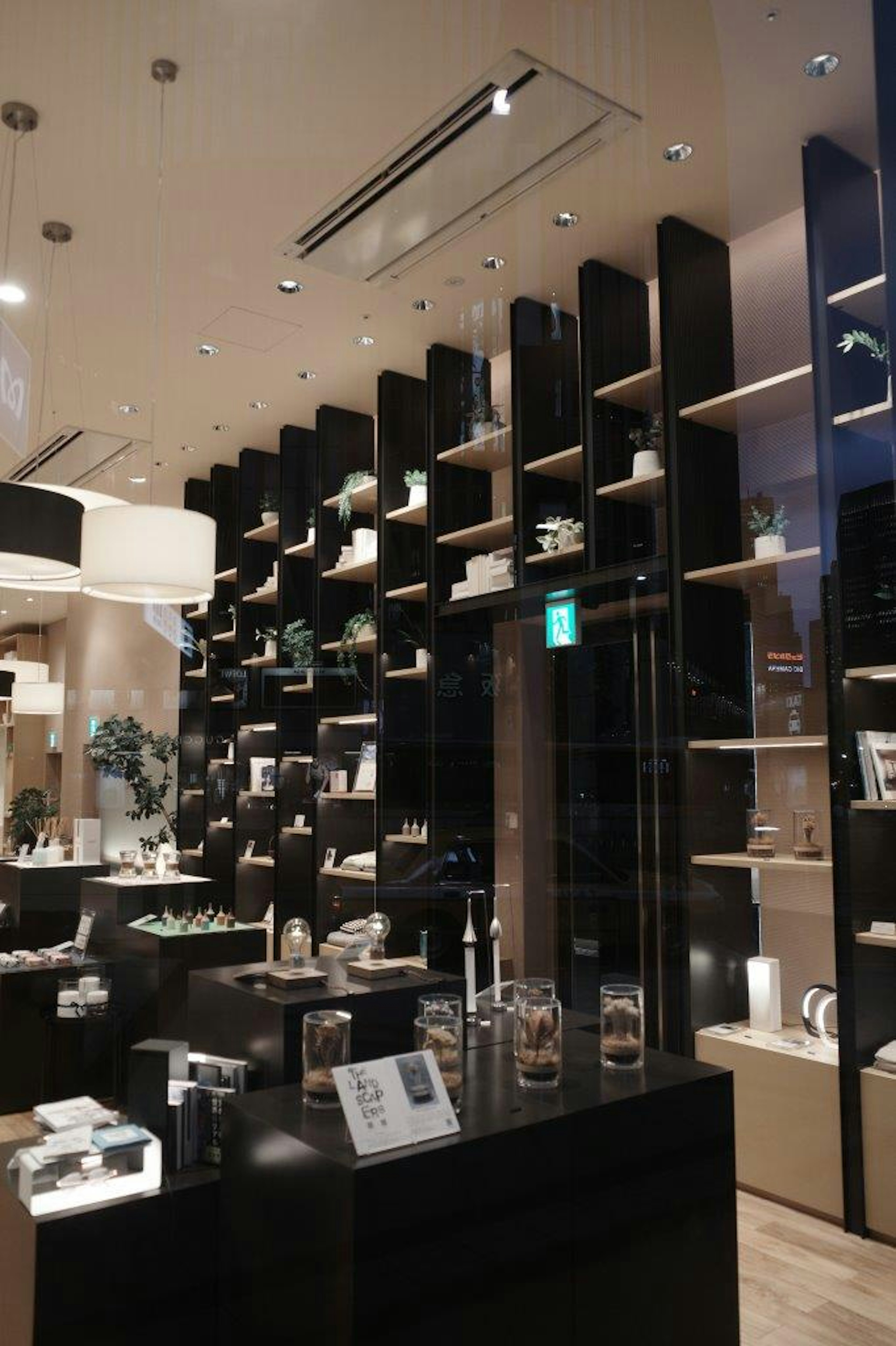 Modern interior of a shop with neatly arranged shelves displaying products