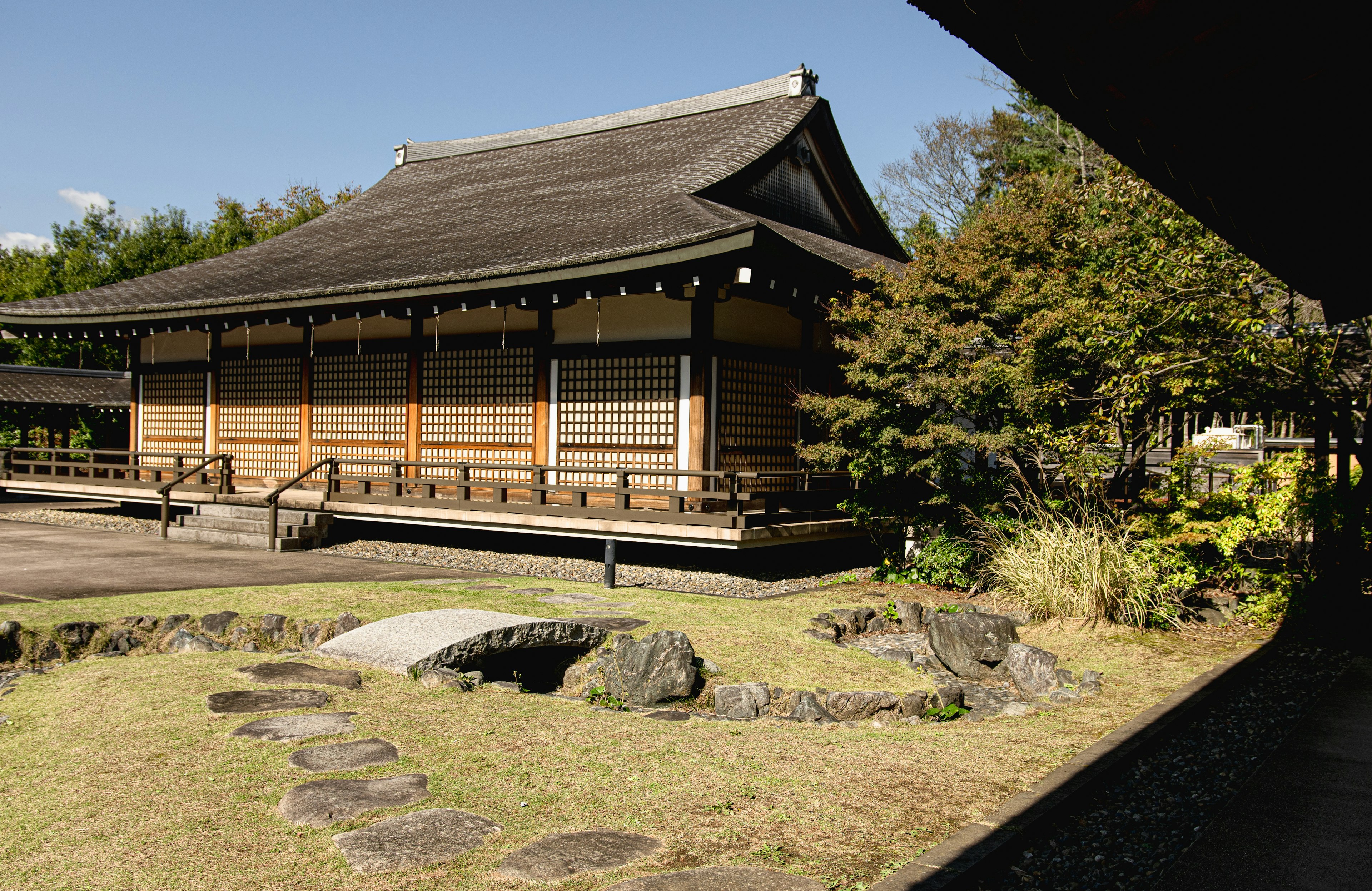 Traditional Japanese building with a serene garden