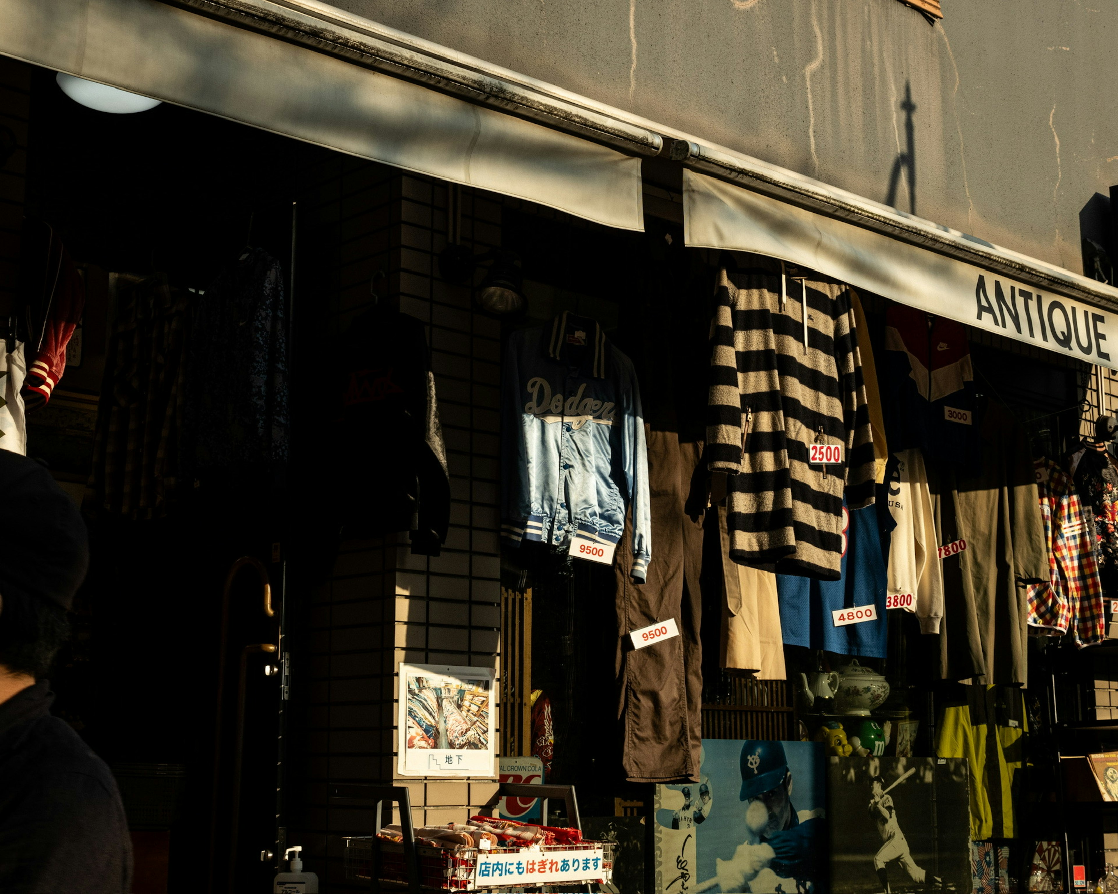 Exterior of an antique shop with vintage clothing hanging