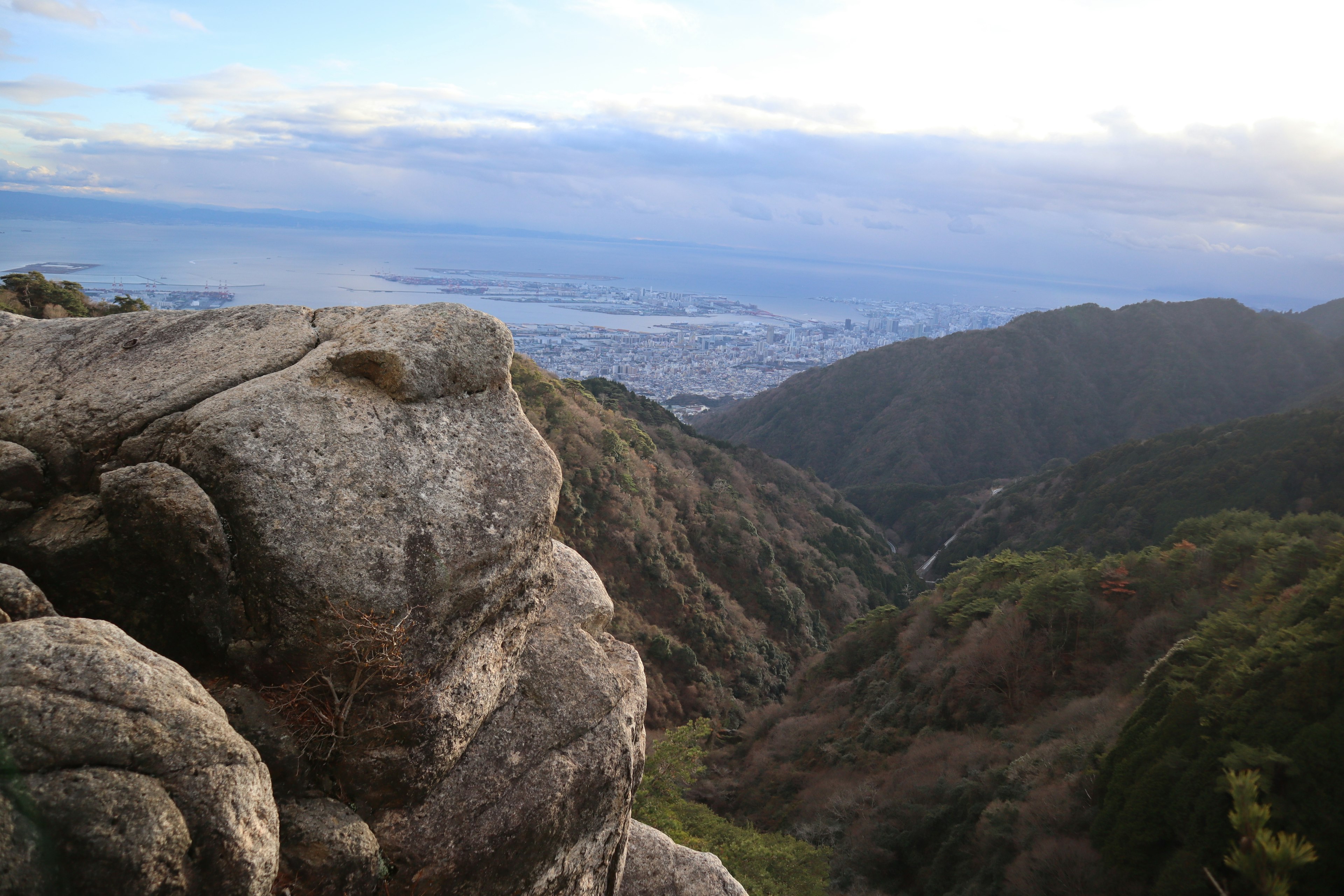 Scenic view from mountain top with close-up of rock