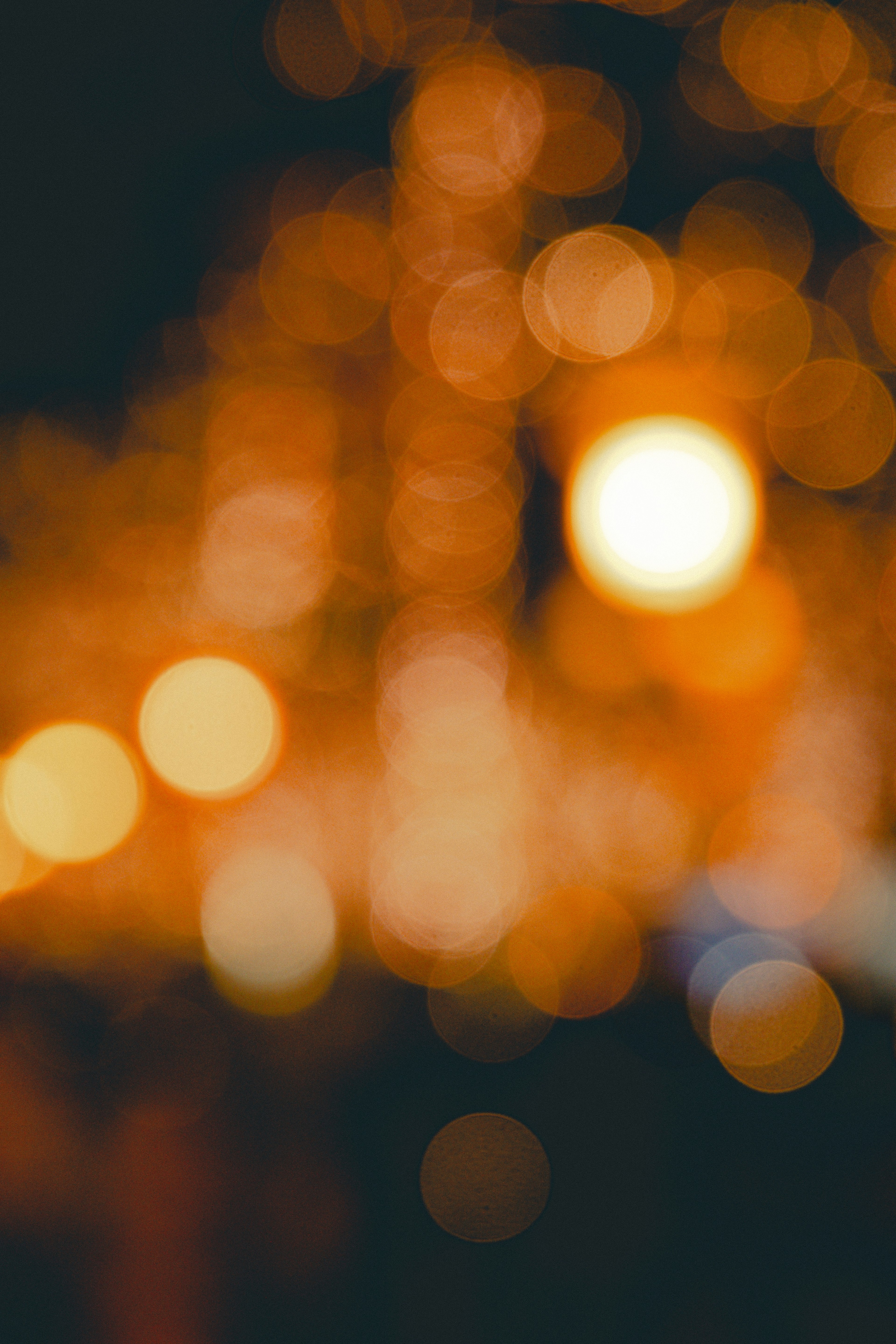 Blurred background with orange bokeh lights