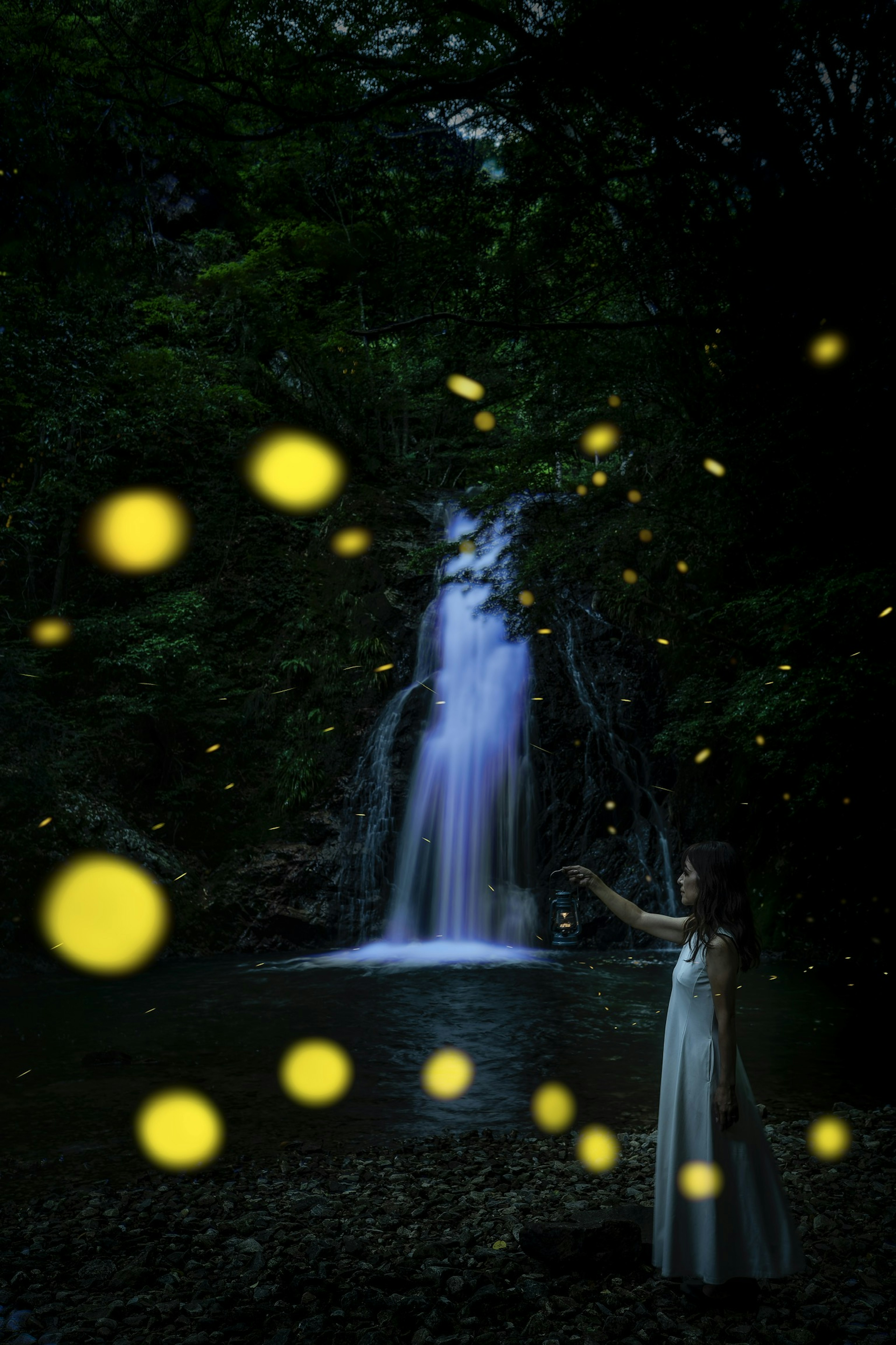 A girl in a white dress standing by a waterfall with glowing yellow fireflies