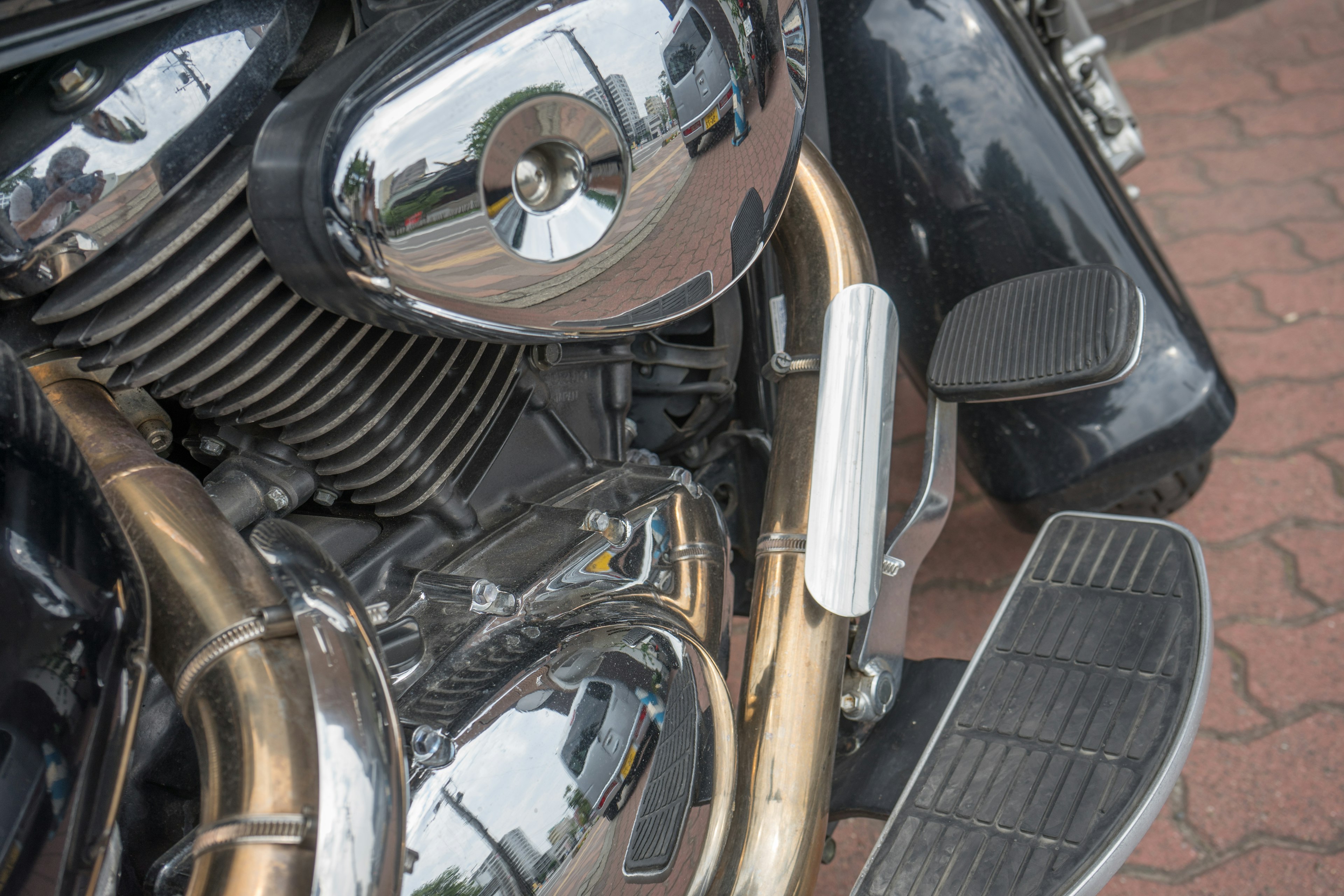 Close-up of a motorcycle engine and chrome parts