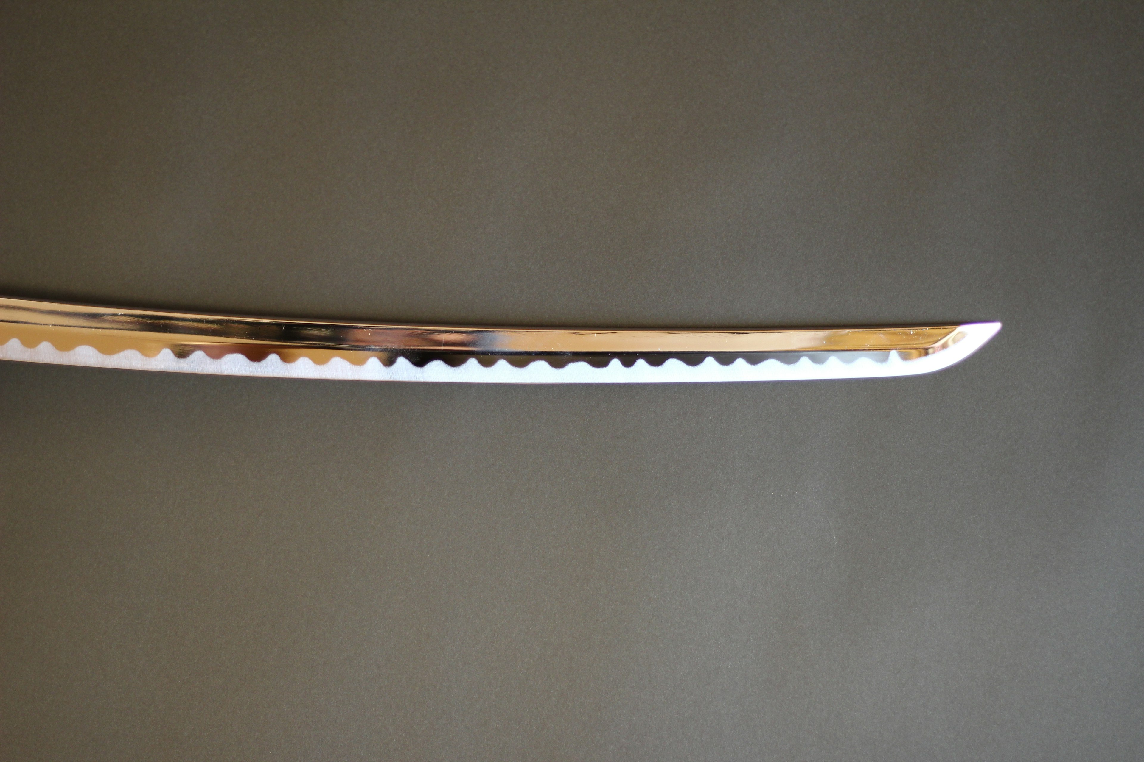 Segment of a Japanese sword with a wavy blade