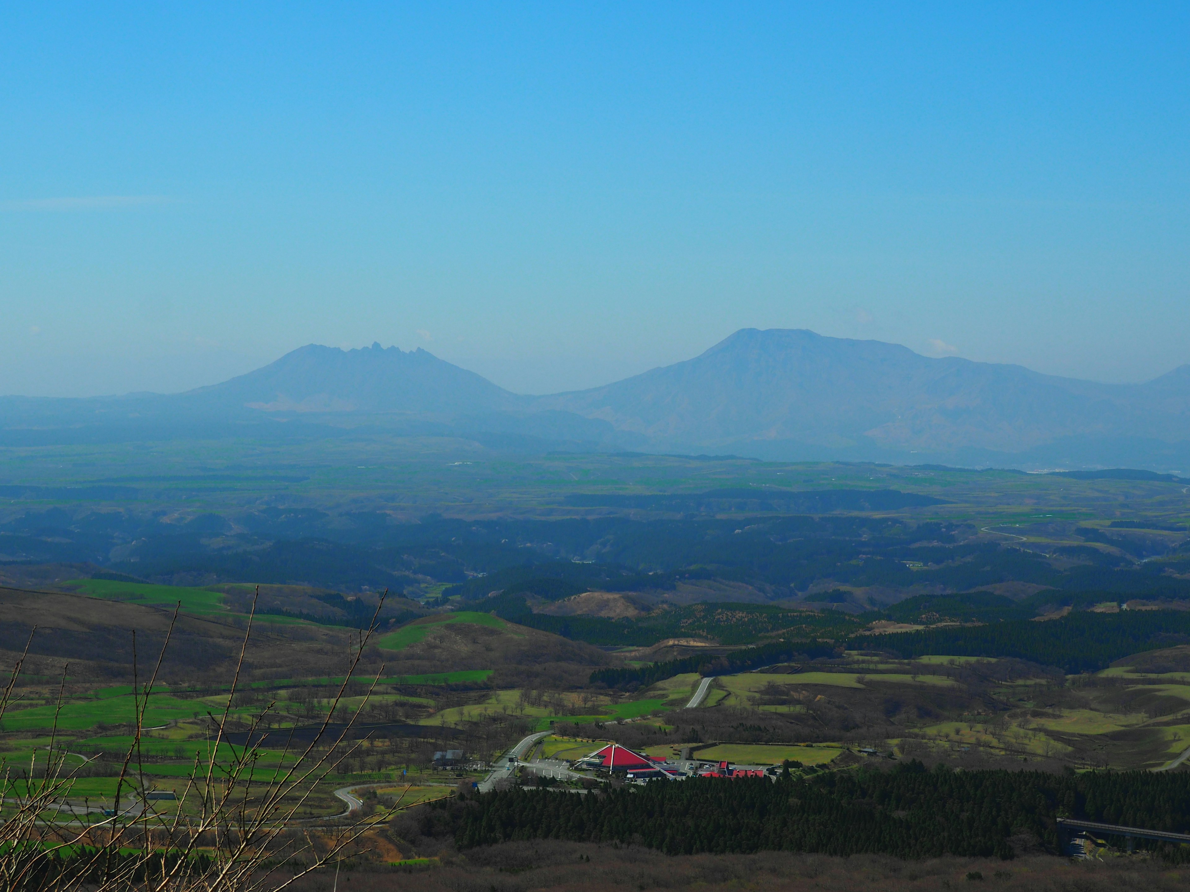 Mountains and green landscape under a blue sky