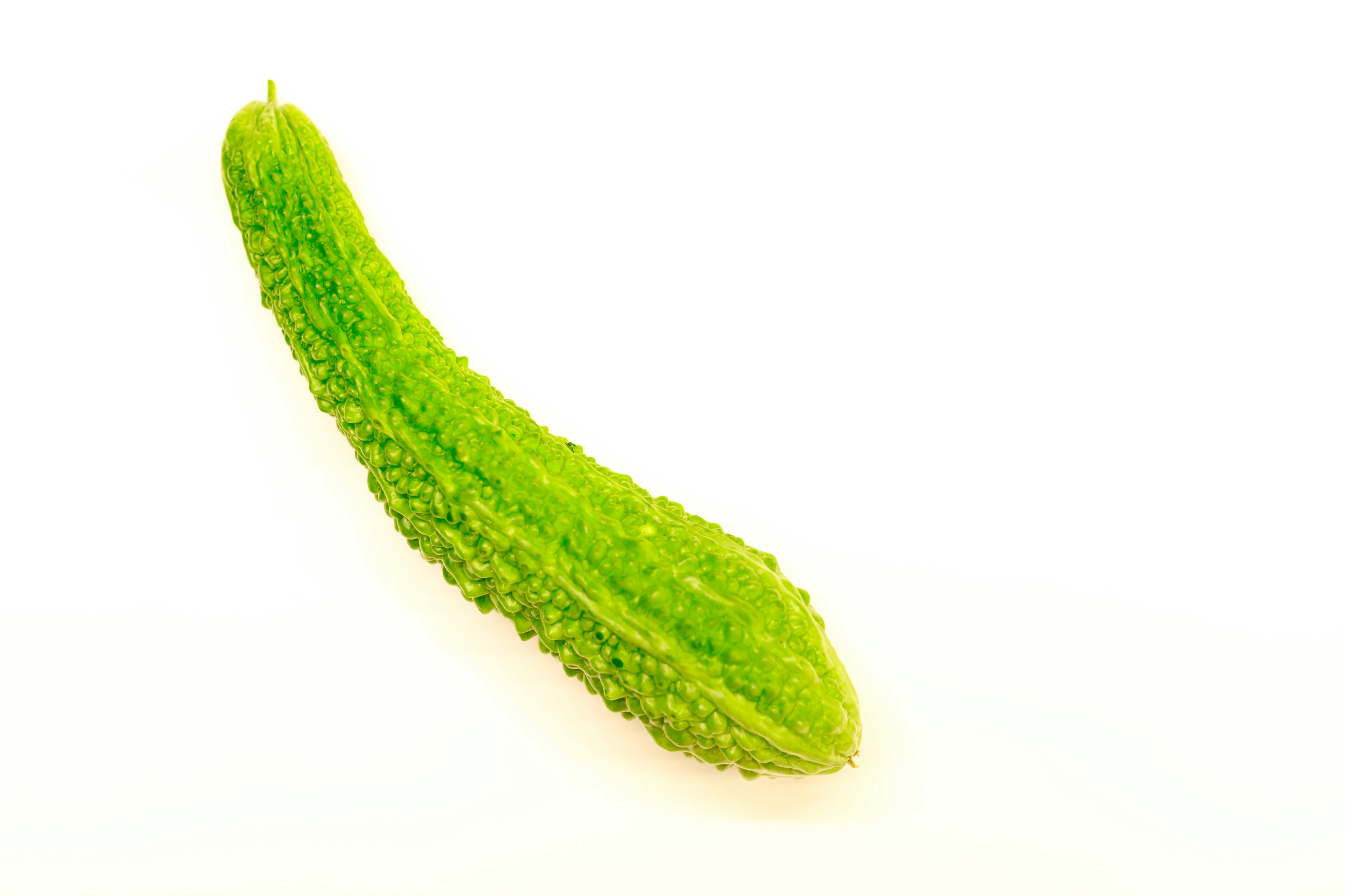 Green cucumber on a white background