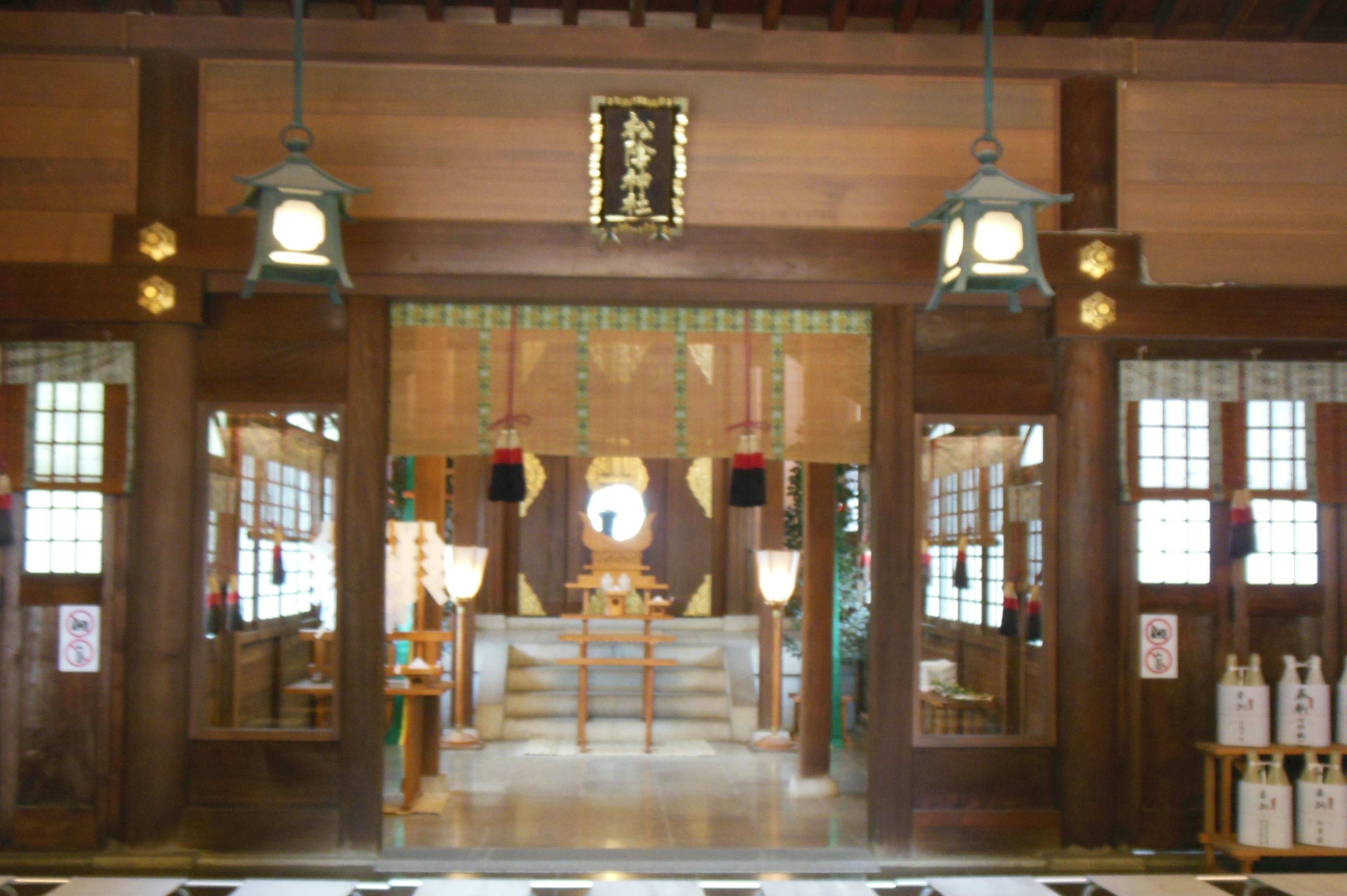 Traditional wooden structure and decorations of a shrine interior