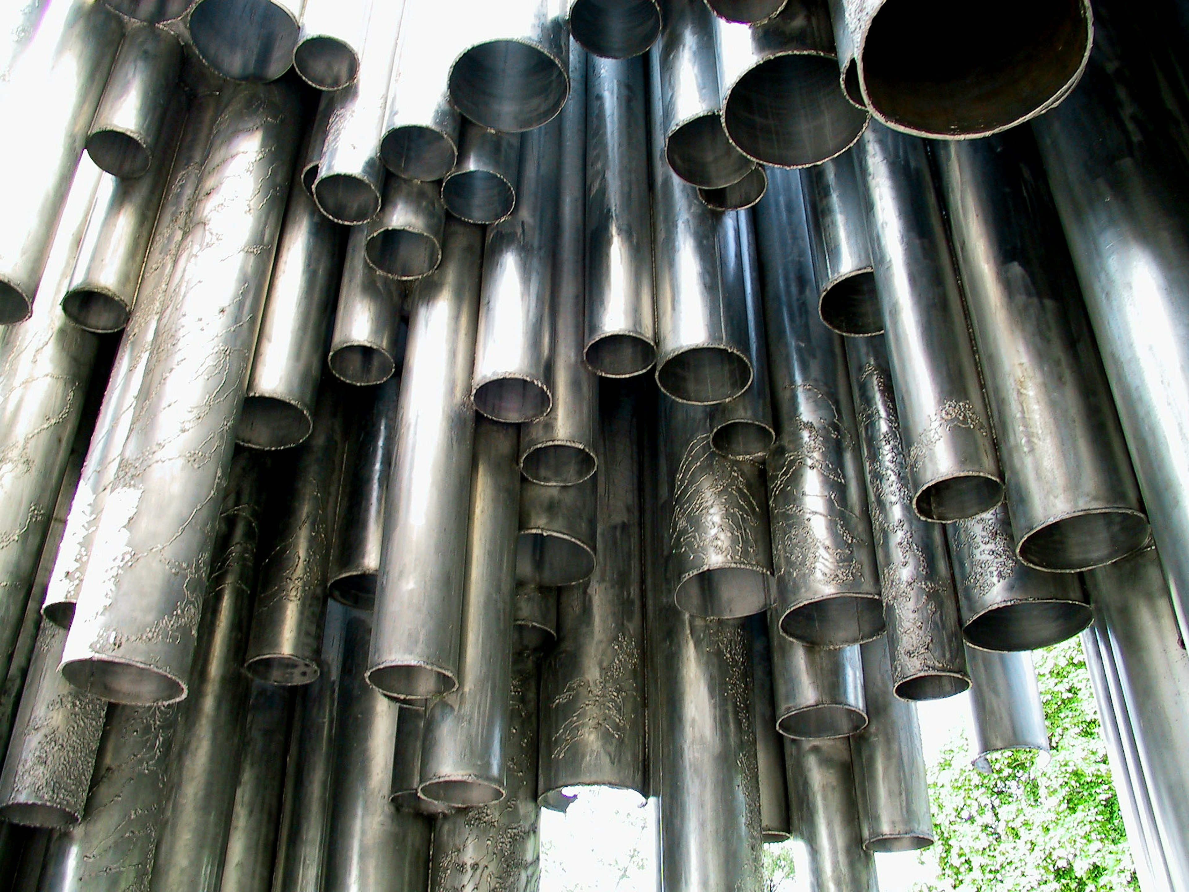 Art installation of hanging metal pipes