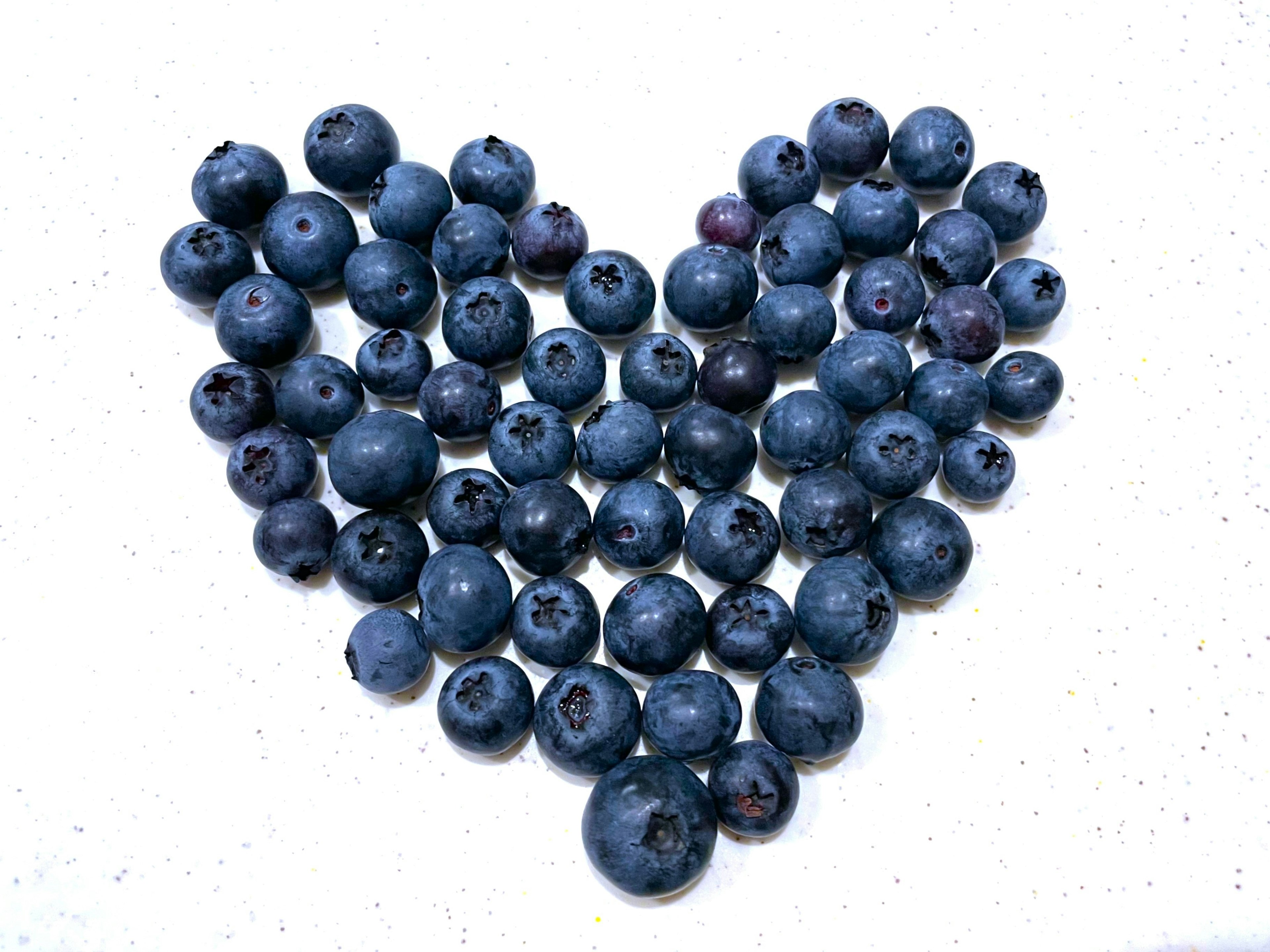 Heart shape made of blueberries