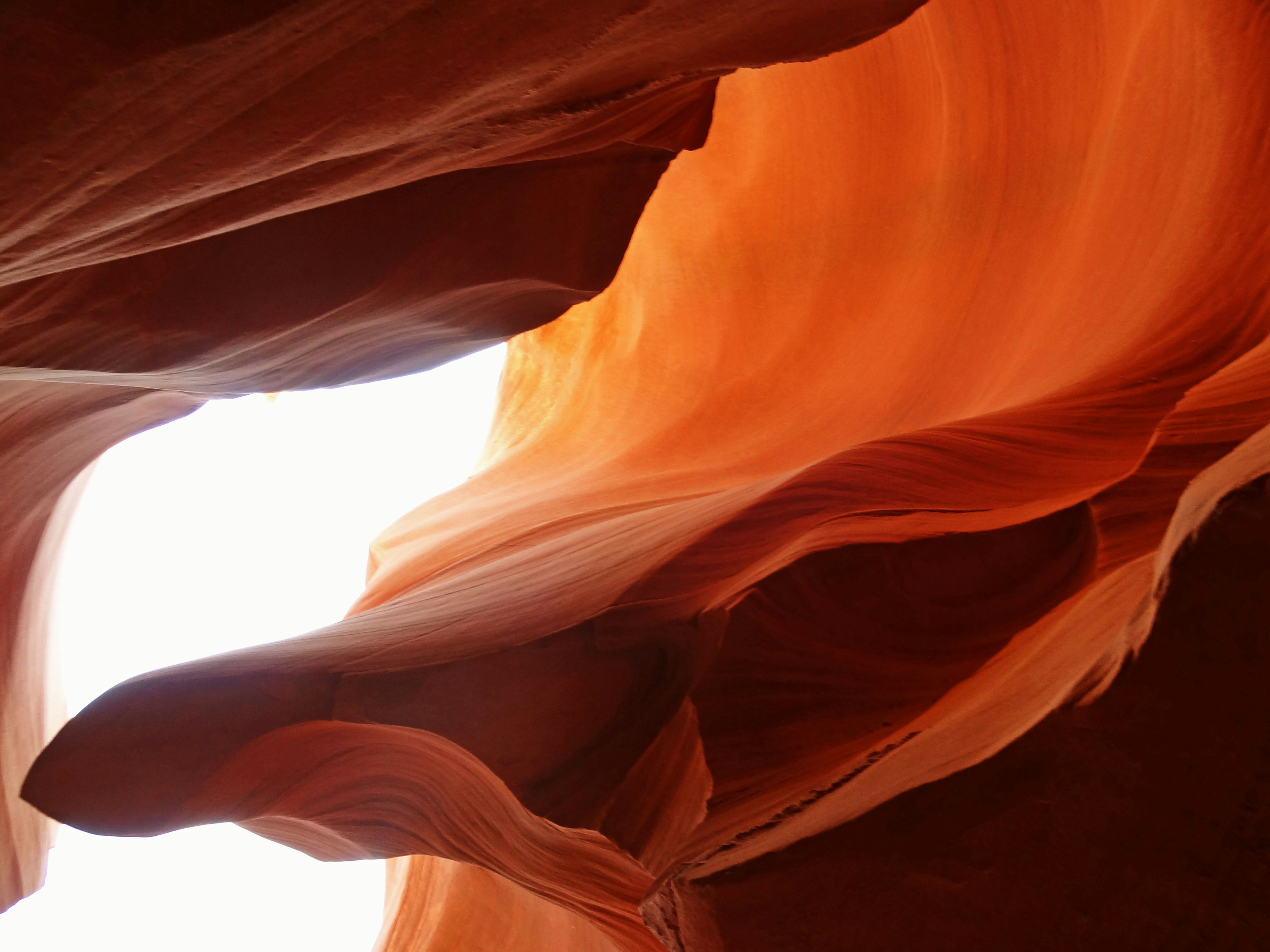 Antelope Canyon with orange rock formations and contrasting light