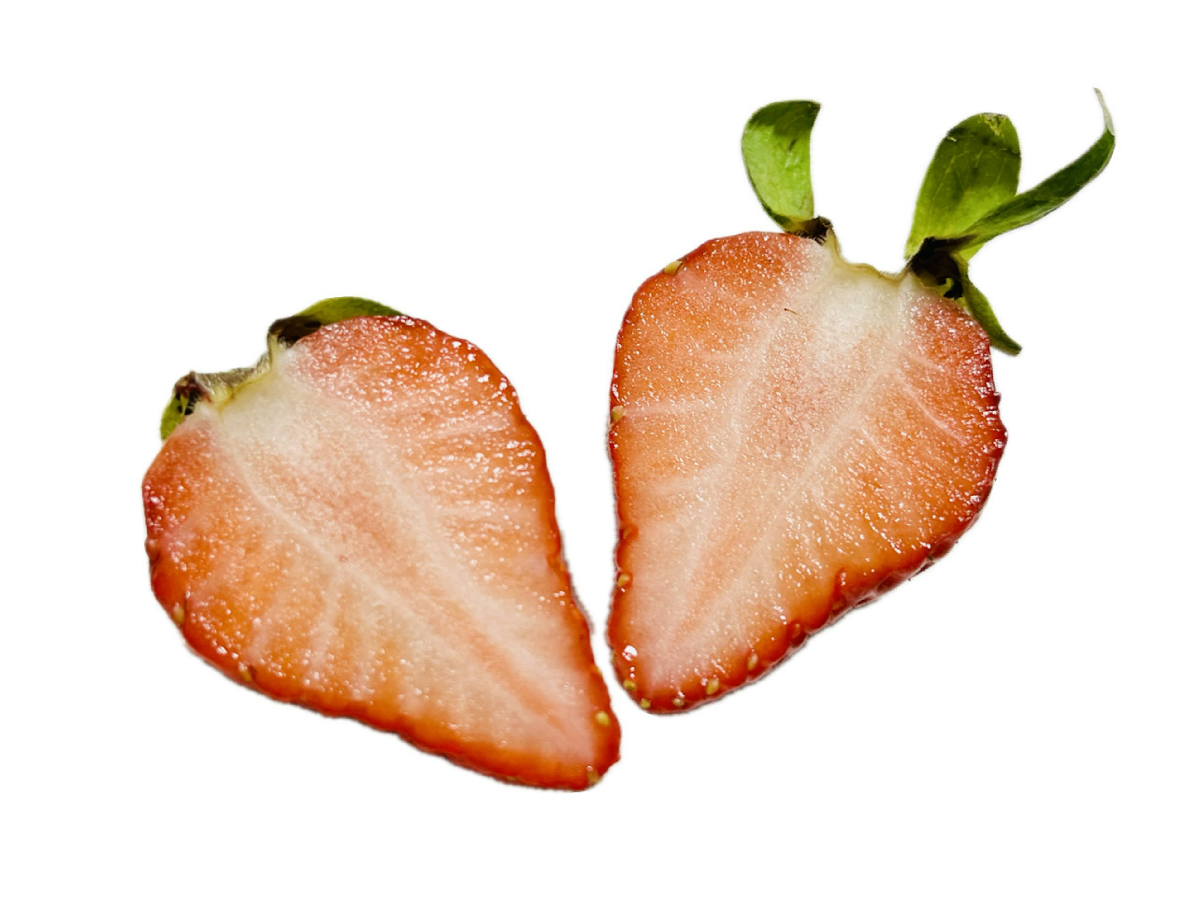 Sliced strawberries on a white background