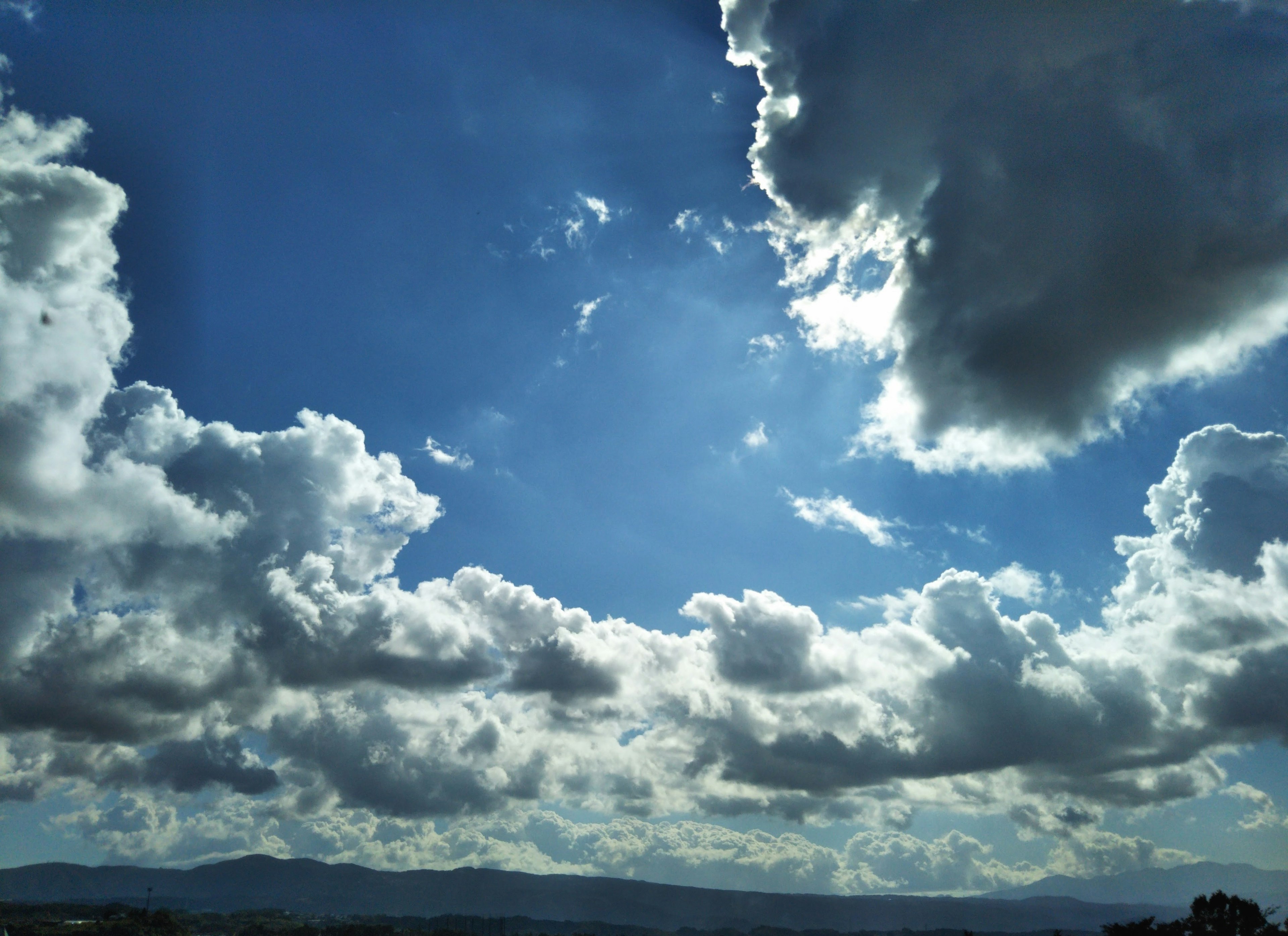 Beautiful landscape with blue sky and fluffy clouds