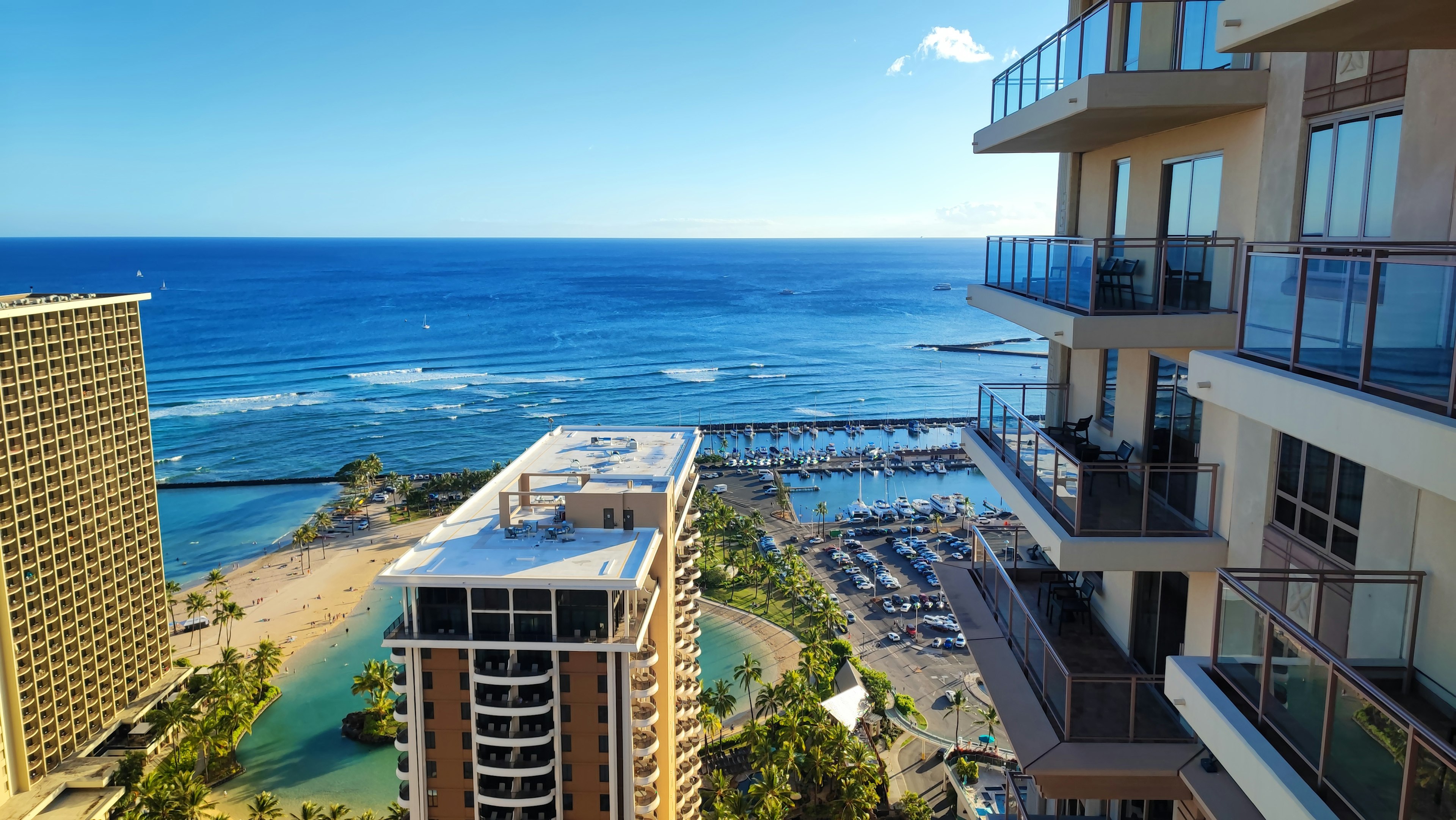 View of the ocean and blue sky from a high-rise building