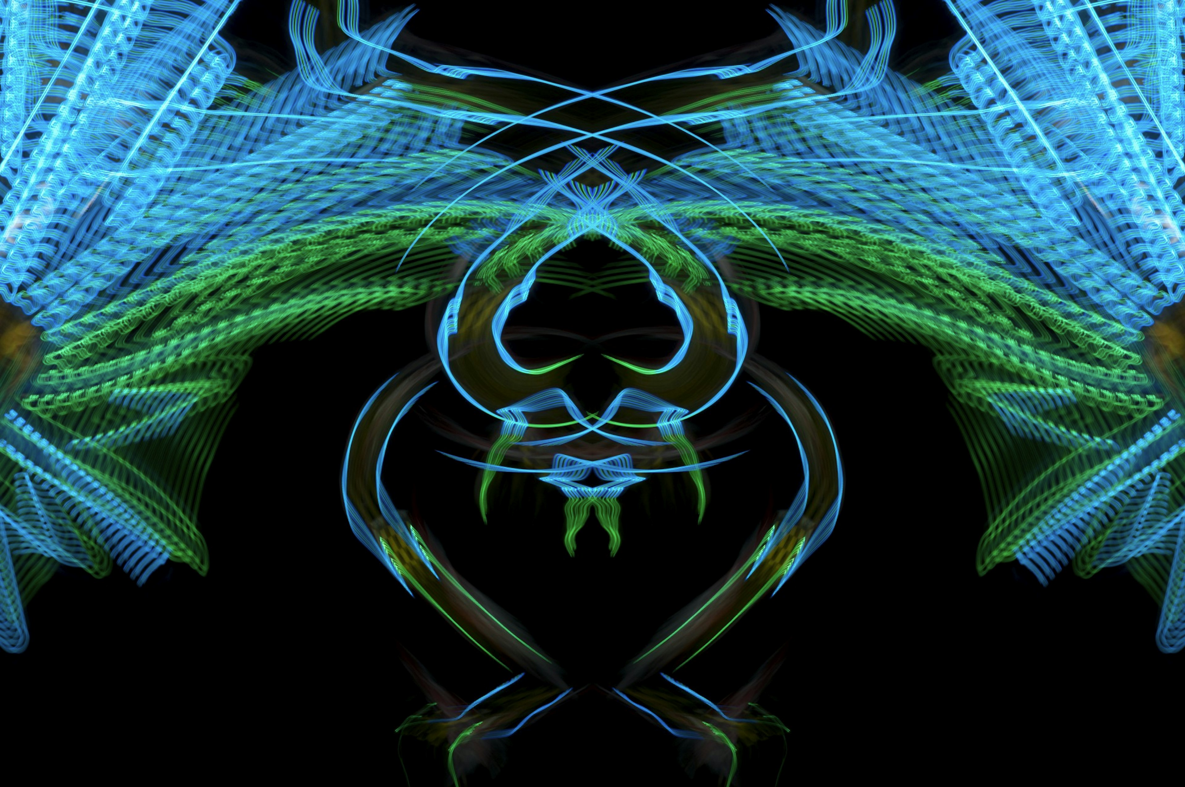 Abstract digital art featuring blue and green light patterns