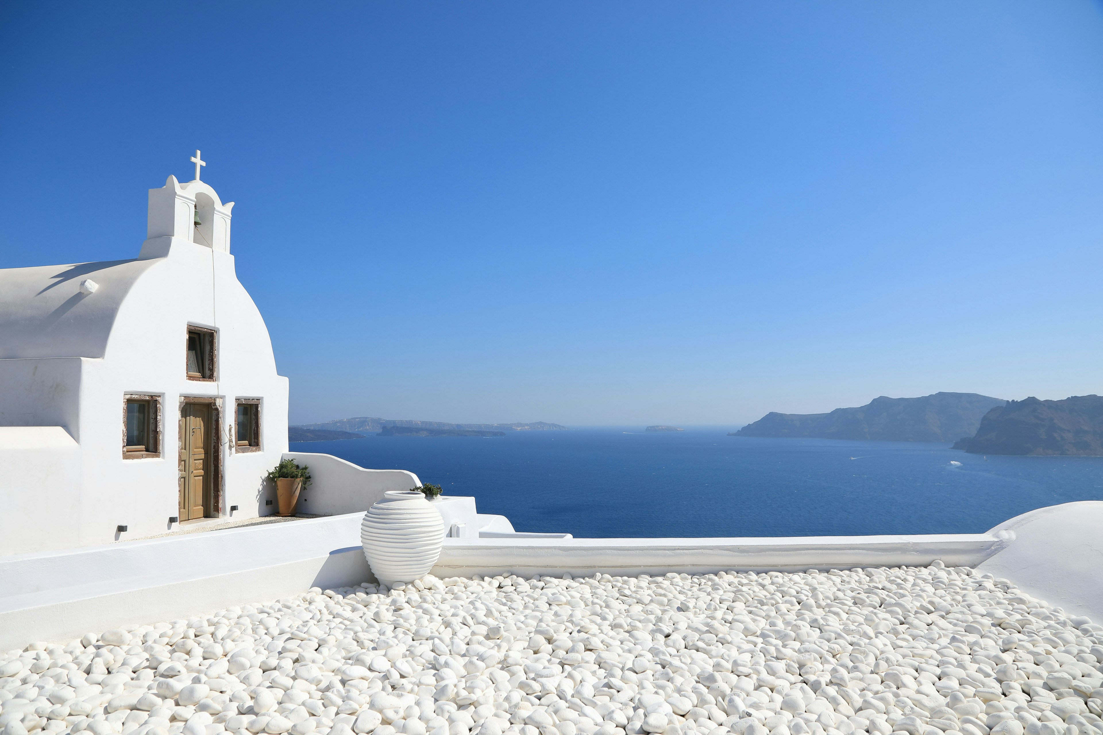 Beautiful view of a white church and blue sea